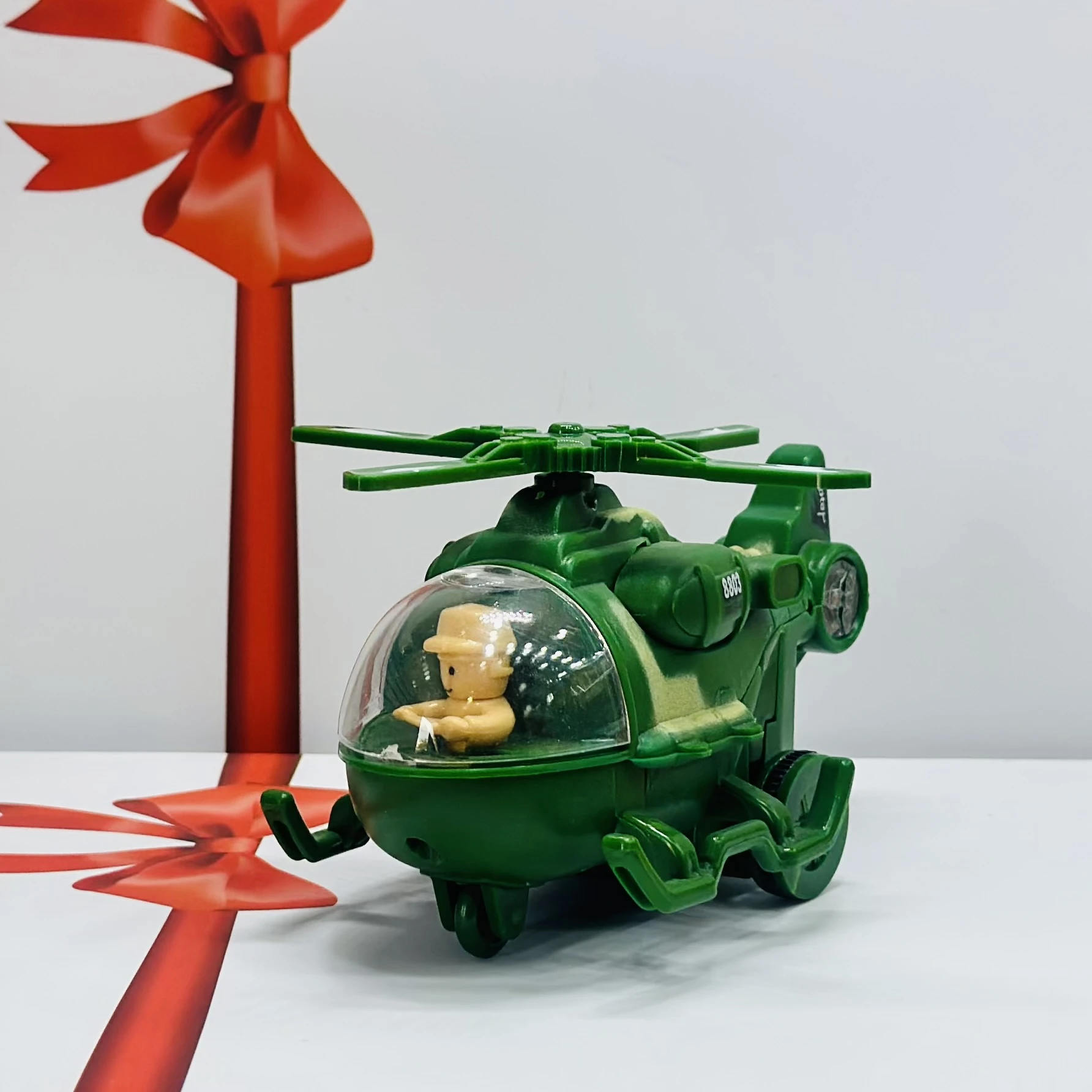 friction-powered toy helicopter