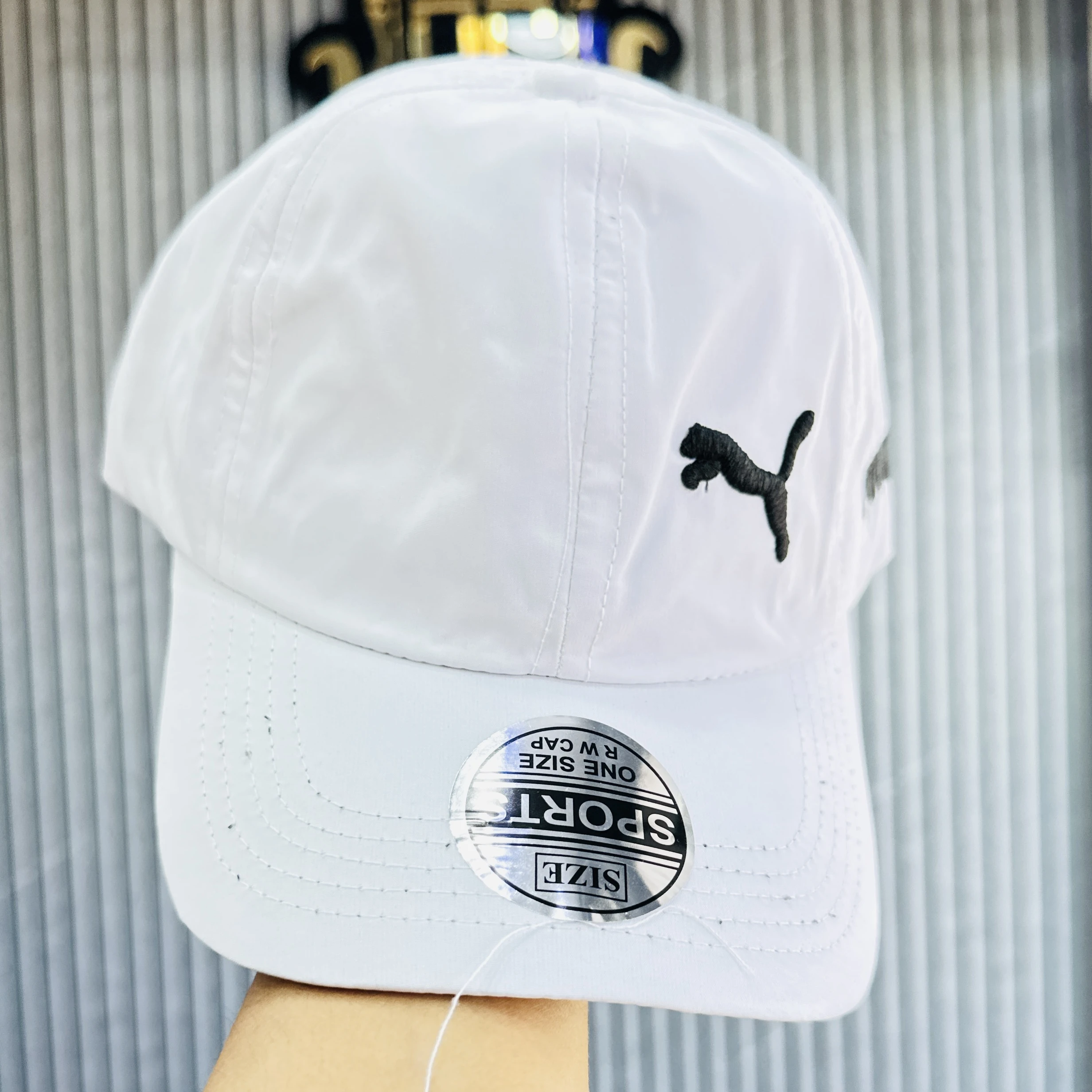 white baseball cap