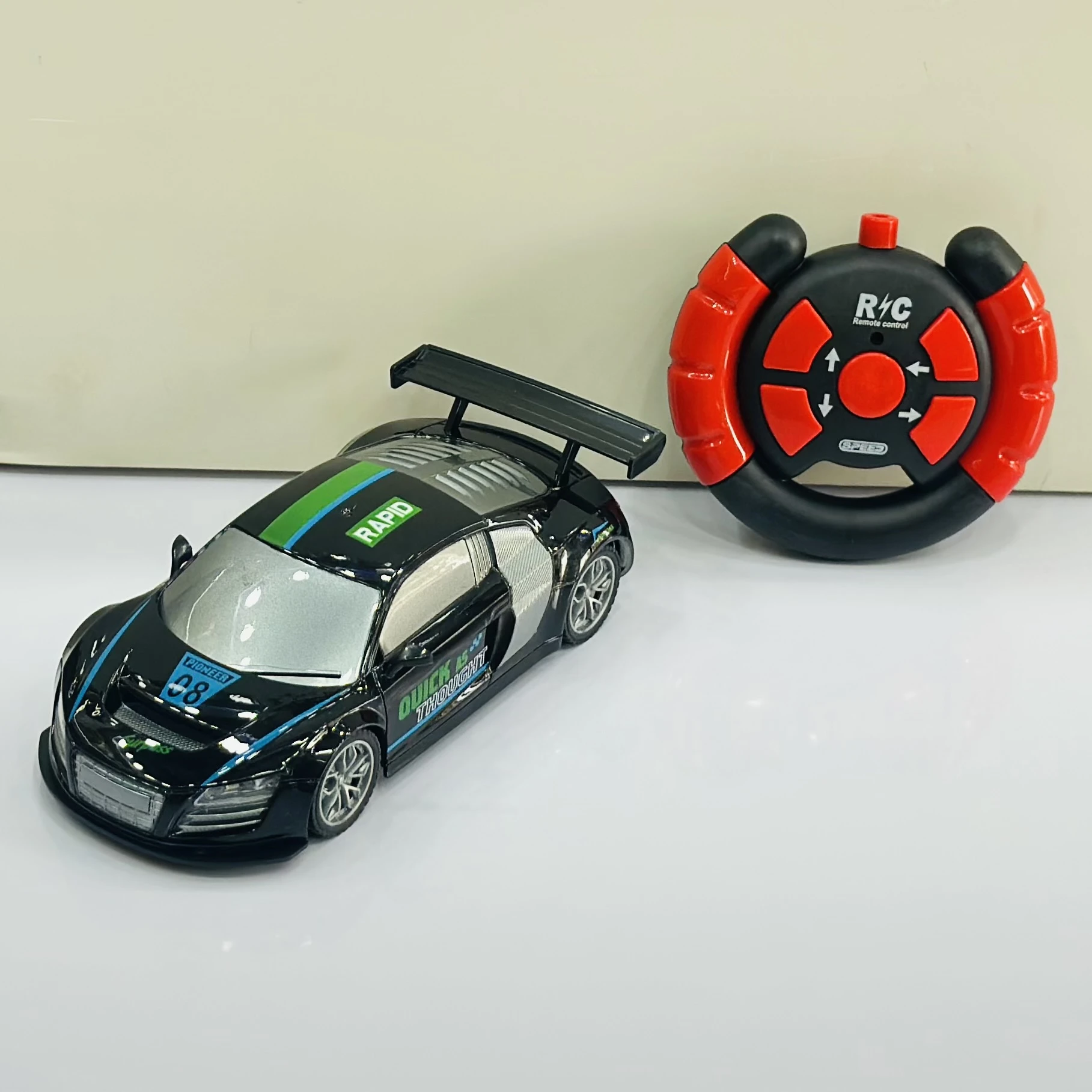 Firerace Championship" 1:18 scale remote-control (R/C) toy car.