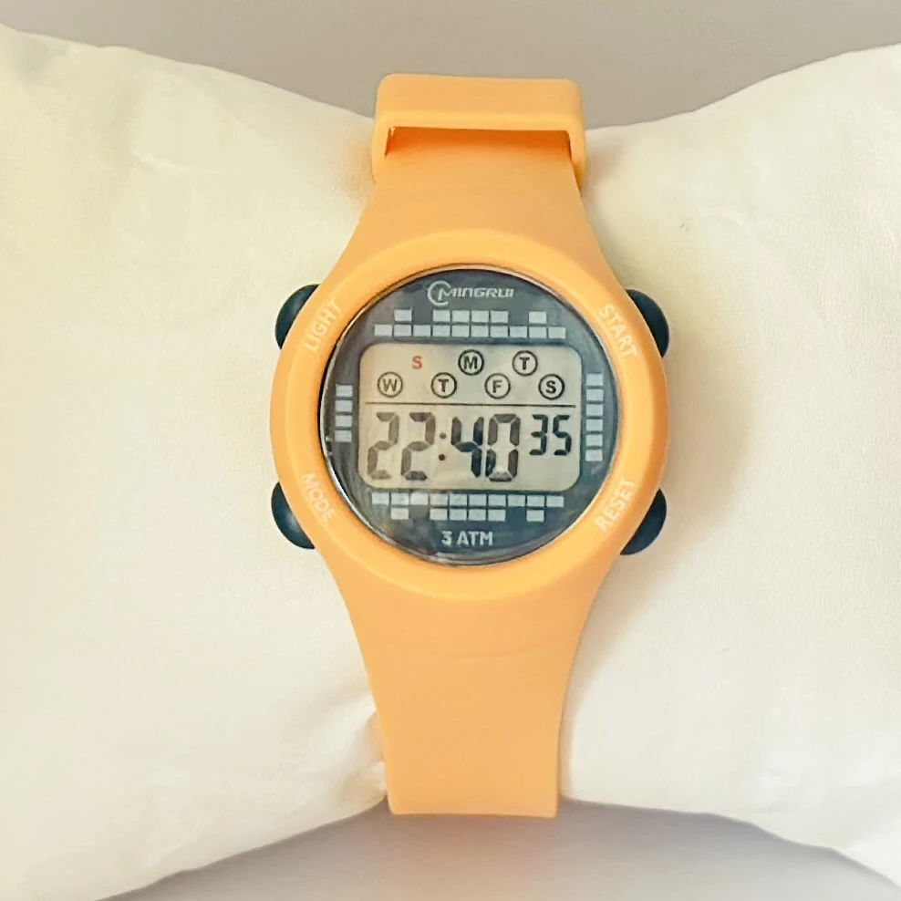 Mingrui digital multi-functional alarm watch with a silicone strap.