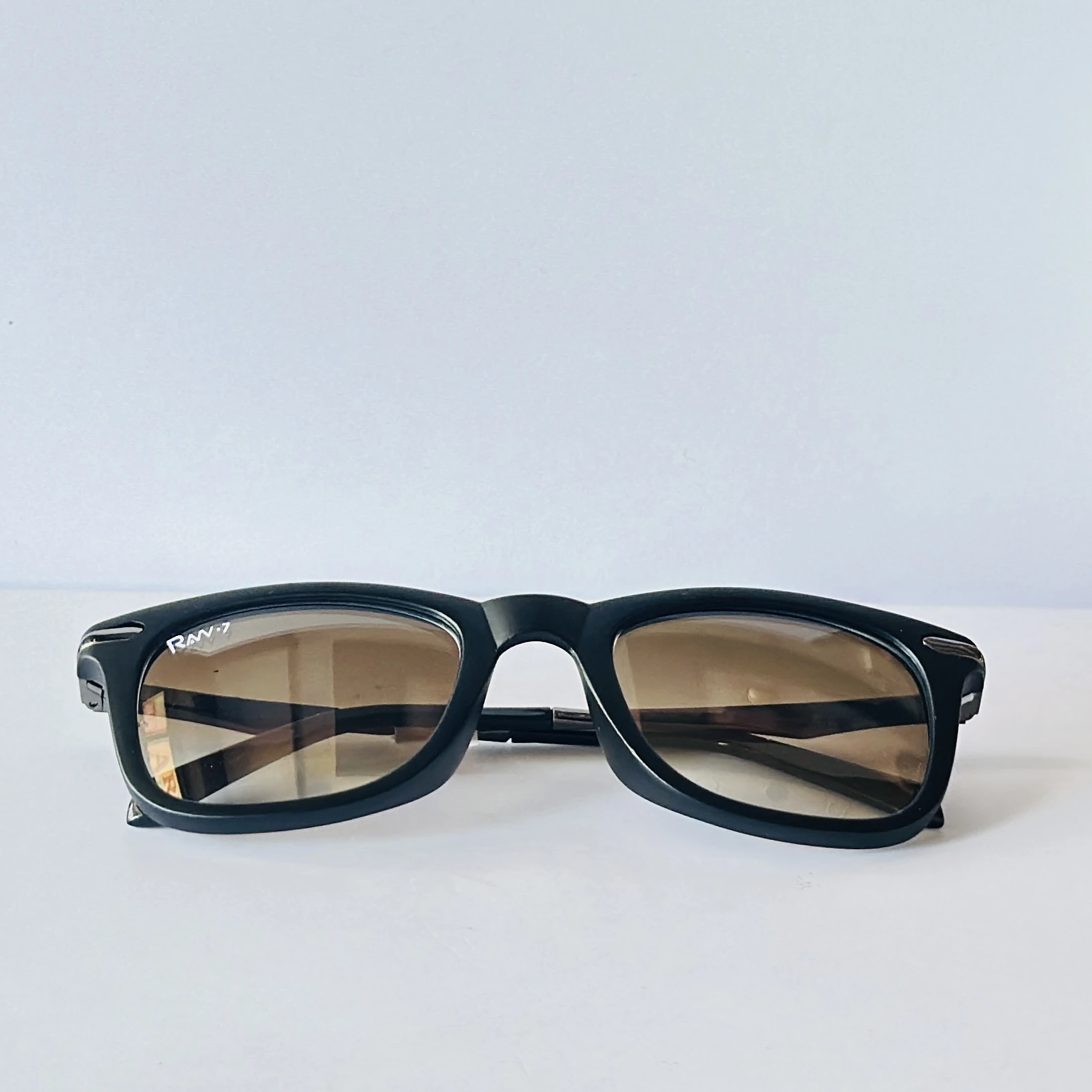 pair of Raw 7 branded men's rectangular sunglasses