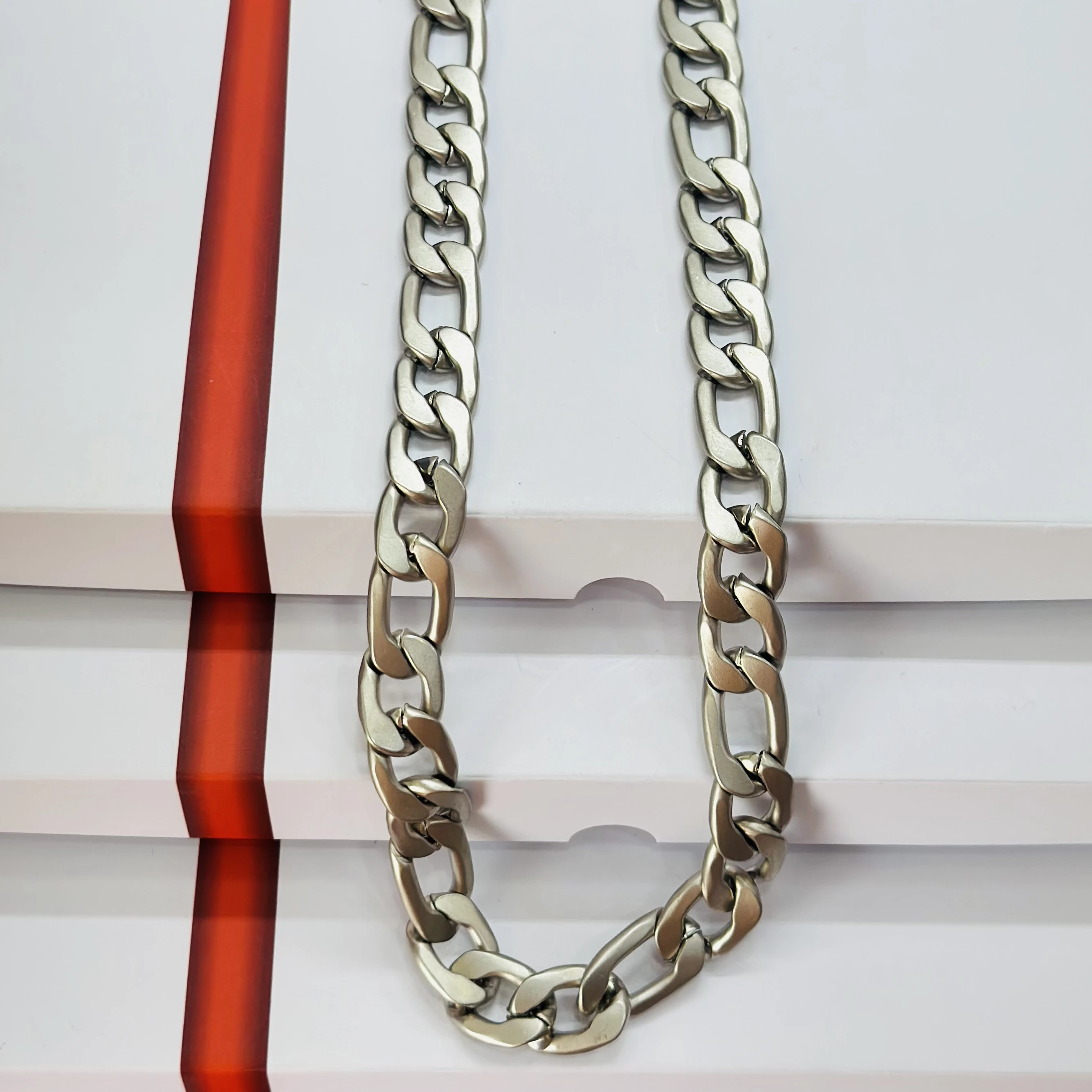 silver-toned metal chain