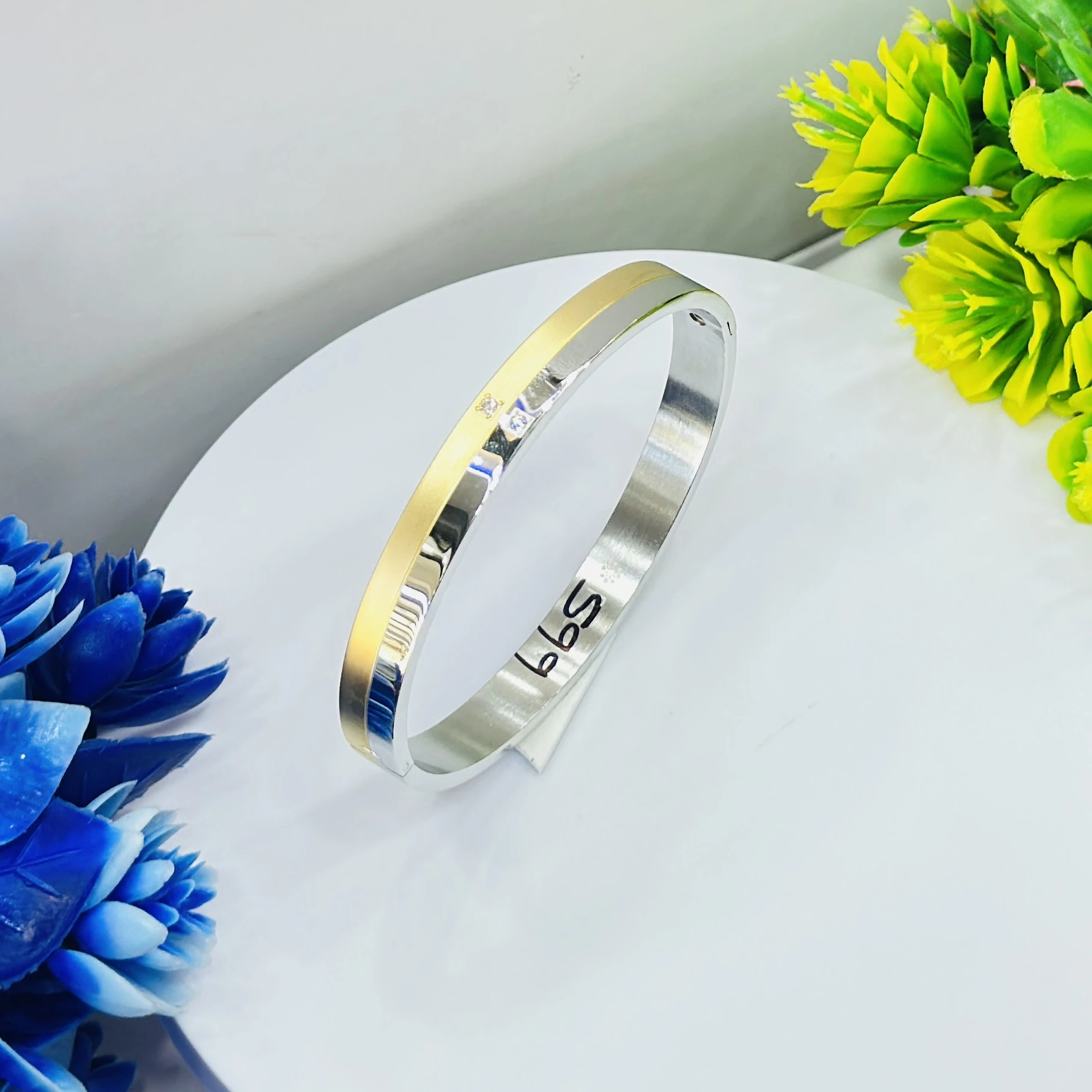 stylish two-tone kada is a stainless steel bracelet