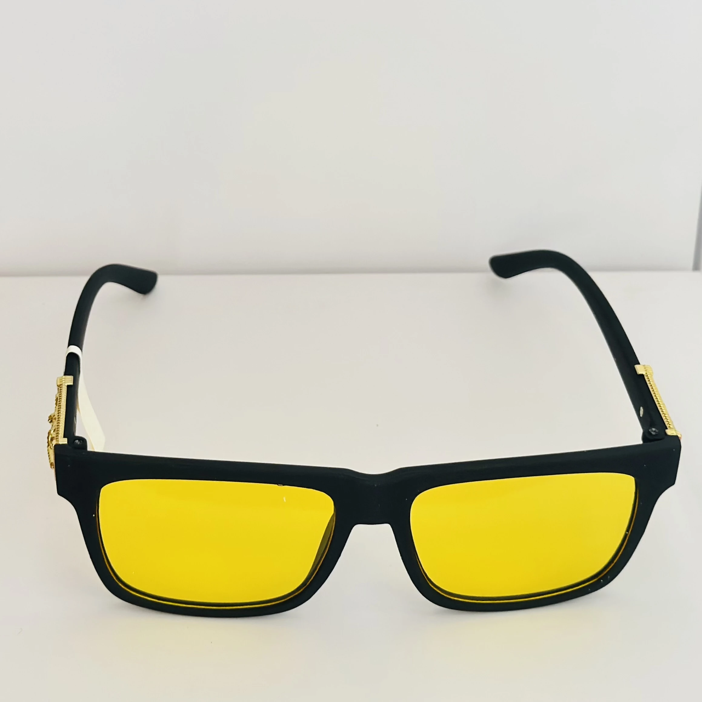 Burberry Knight BE4358 3001/85 square sunglasses in a black acetate frame with yellow lenses.