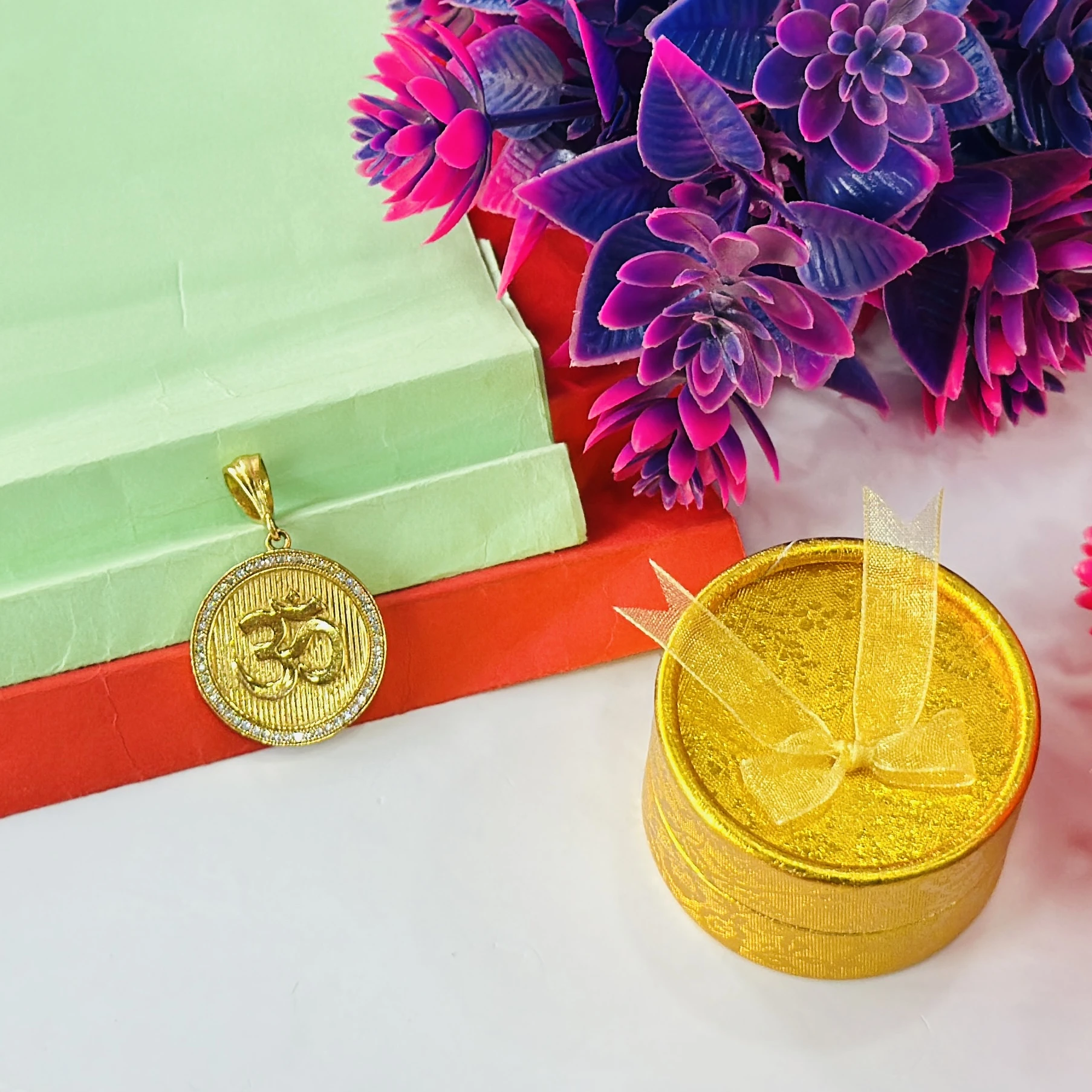 Round gold and diamond Om pendant