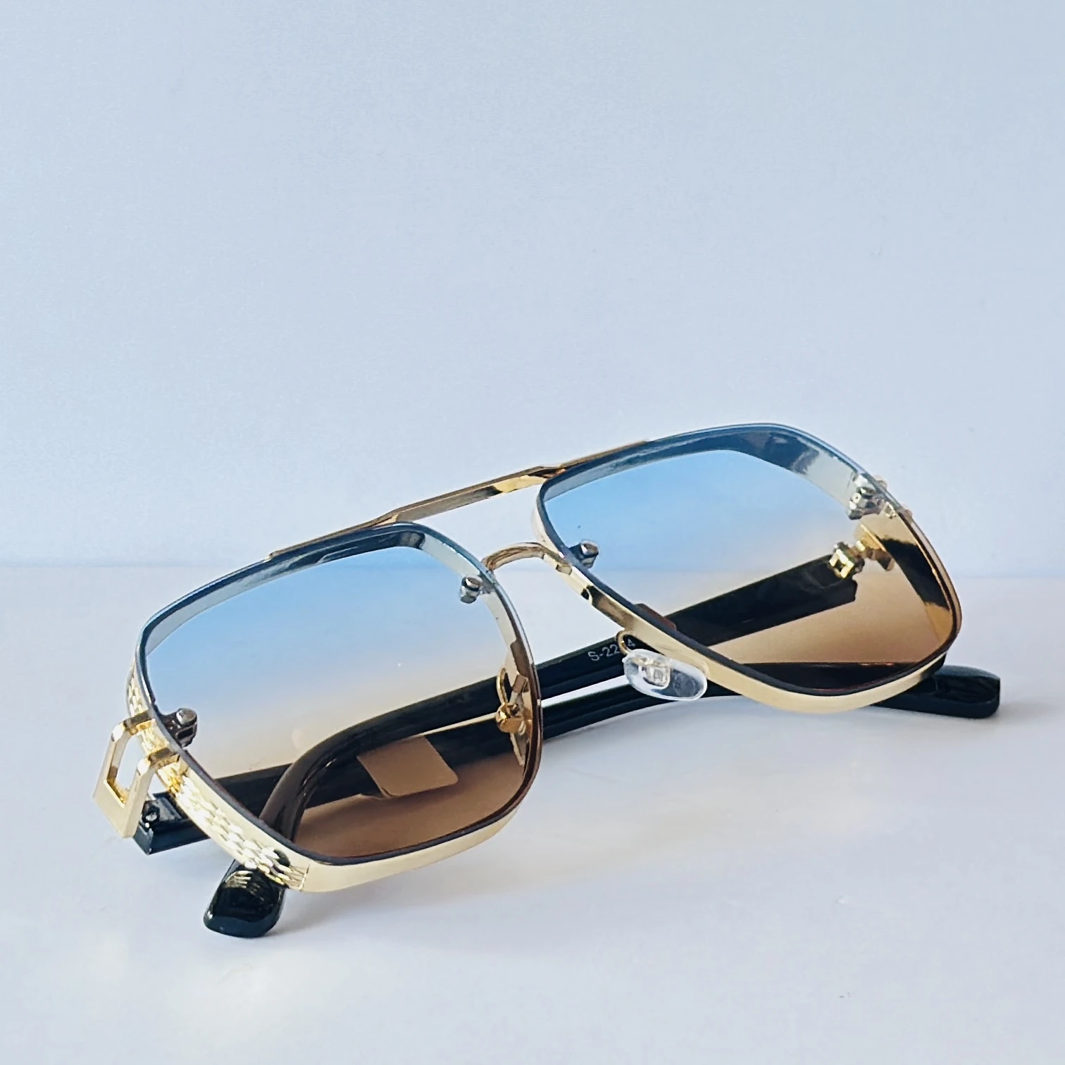 sunglasses appear to be the Maybach