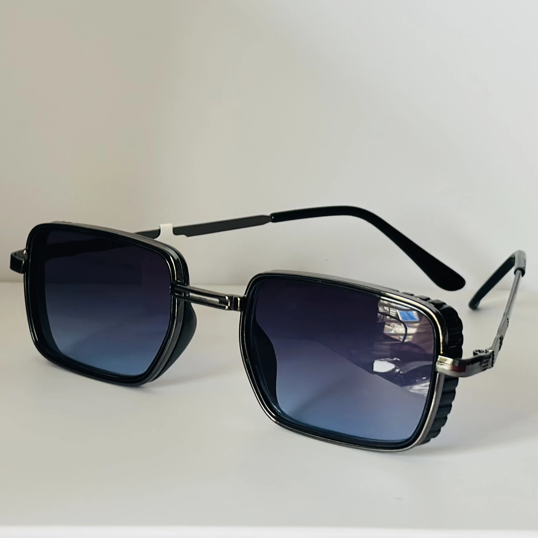 pair of Aedoll Goggle sunglasses with a gold metal frame and pink gradient lenses.