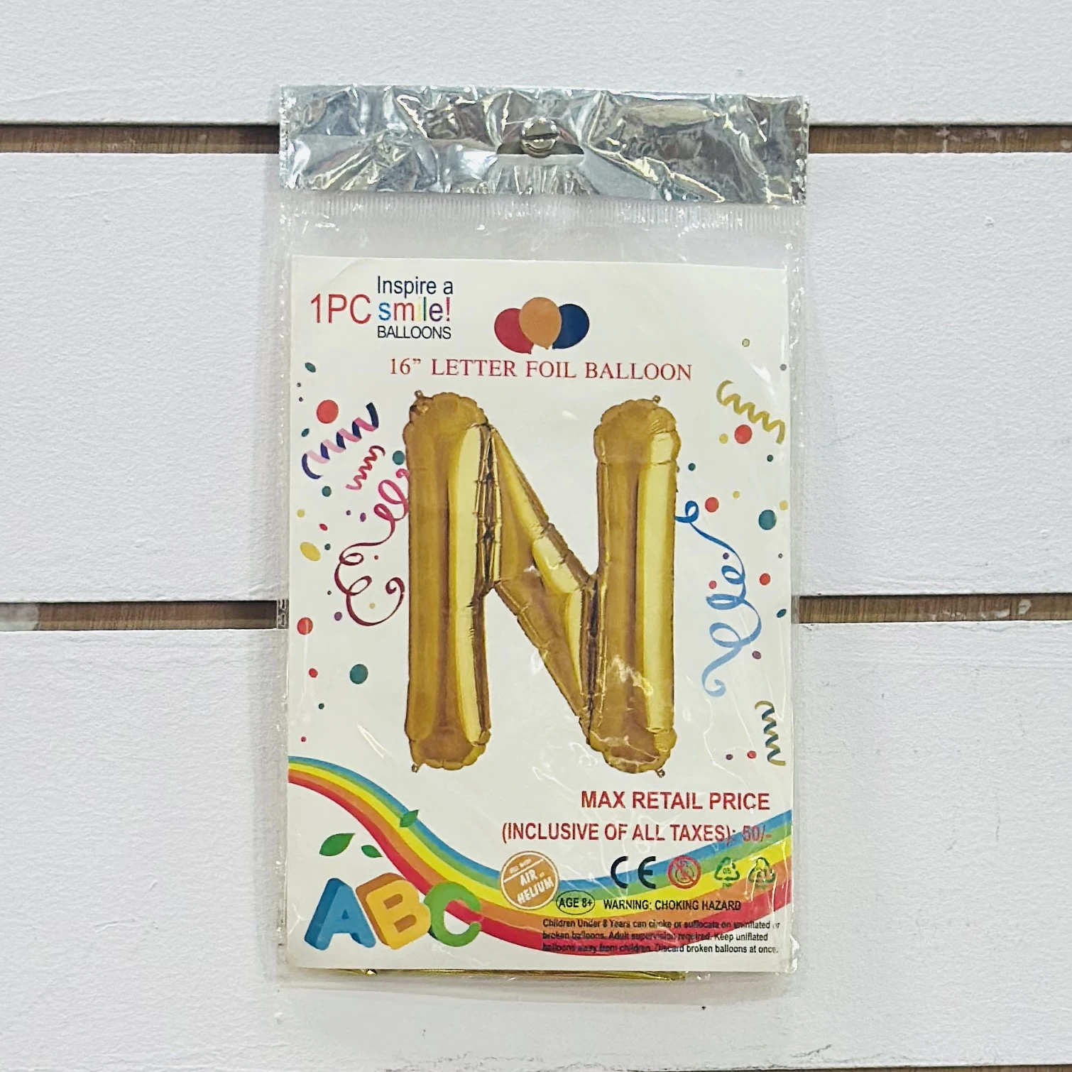 Gold foil letter "N” balloon