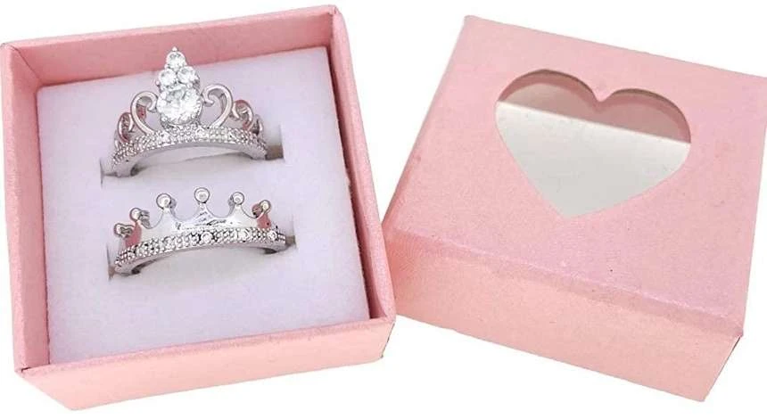 Set of silver-plated, cubic zirconia-studded, adjustable crown couple rings.