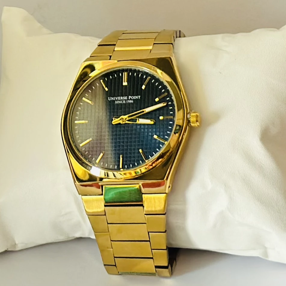 Analog Watch with a golden dial and stainless steel strap