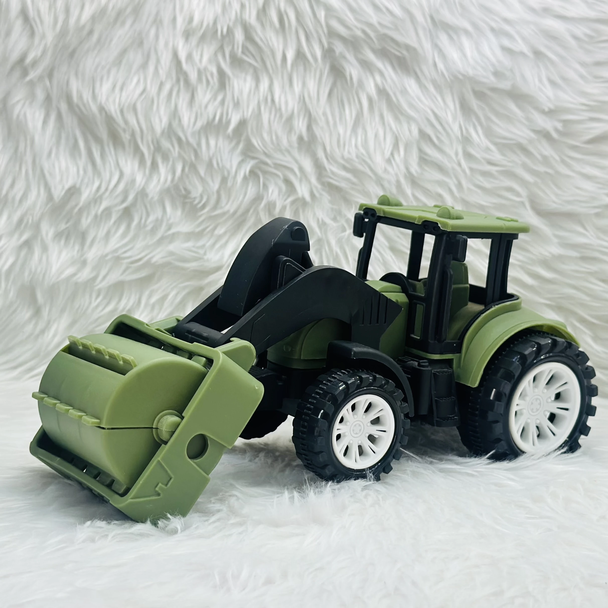 friction-powered road roller toy truck.