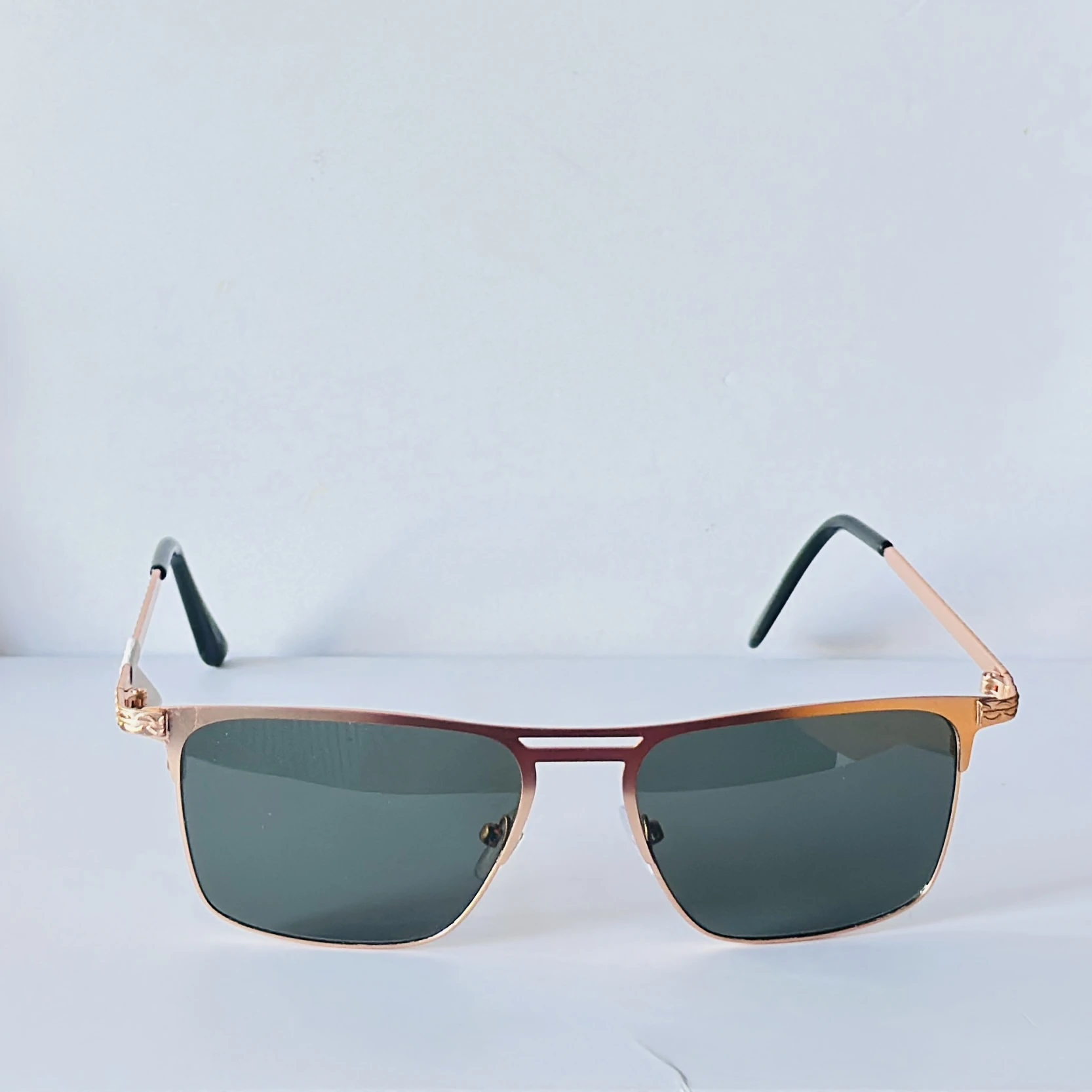 sunglasses appear to be the Vincent Chase