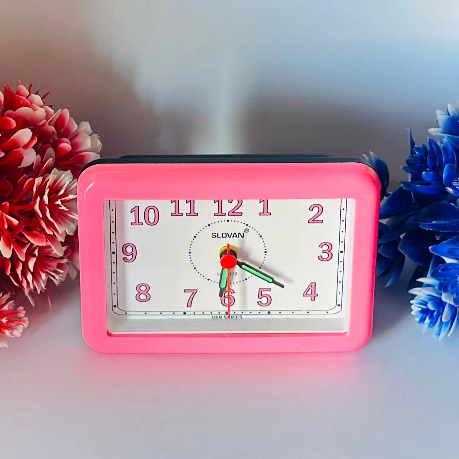 Alarm watch with pink color