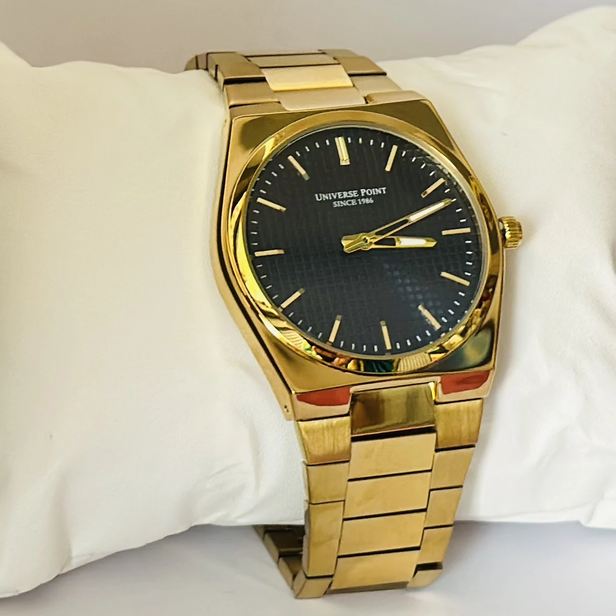 Analog Watch with a golden dial and stainless steel strap