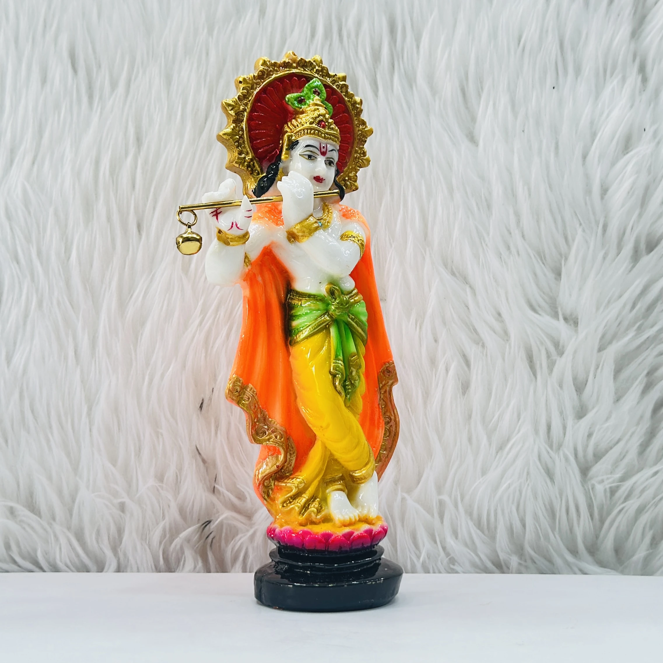 polyresin Krishna idol is a beautiful decorative showpiece