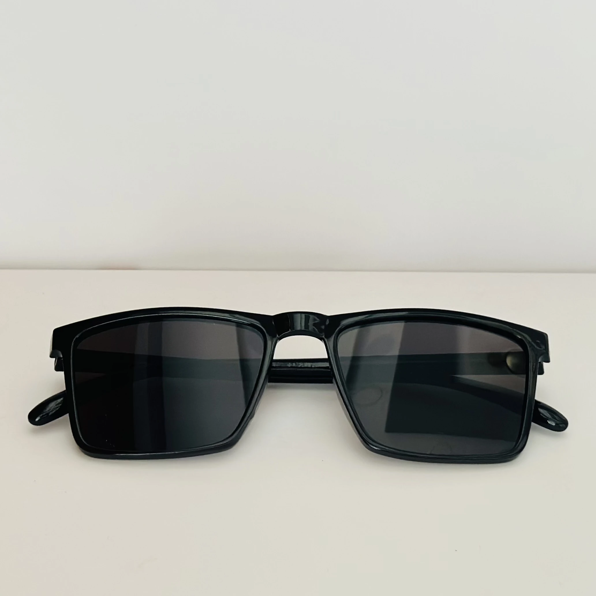 Tommy Hilfiger TH 2077/S sunglasses in black with carbon fiber temples.