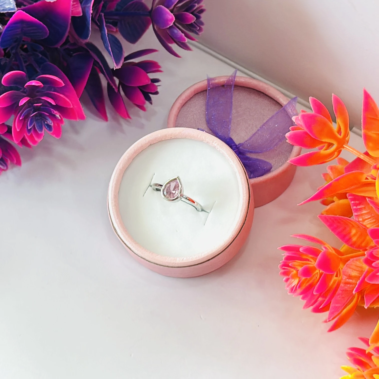 pear-cut pink cubic zirconia or pink sapphire ring