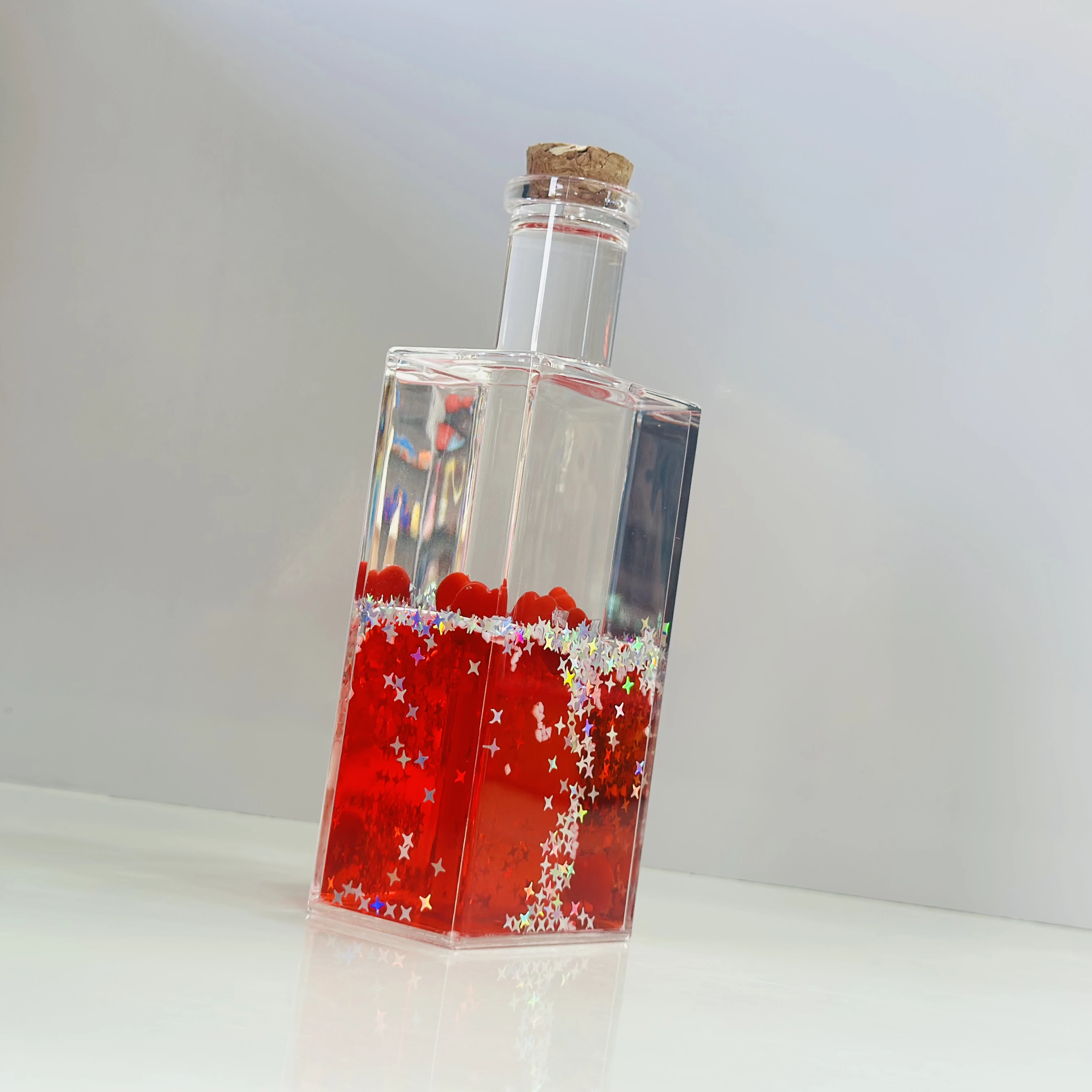 decorative fluid bottle with hearts and stars. (SKU-S4IER4)