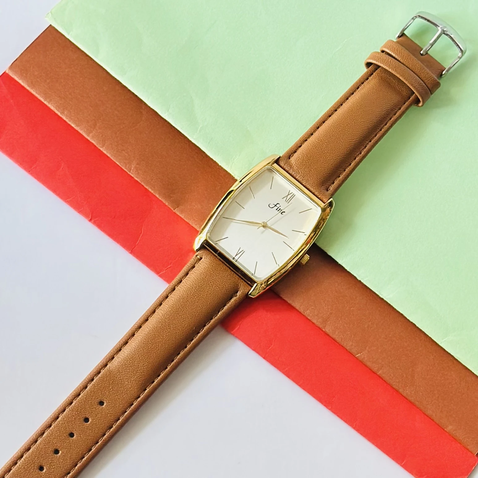 Edge Quartz Analog watch for men with a white dial and brown leather strap.