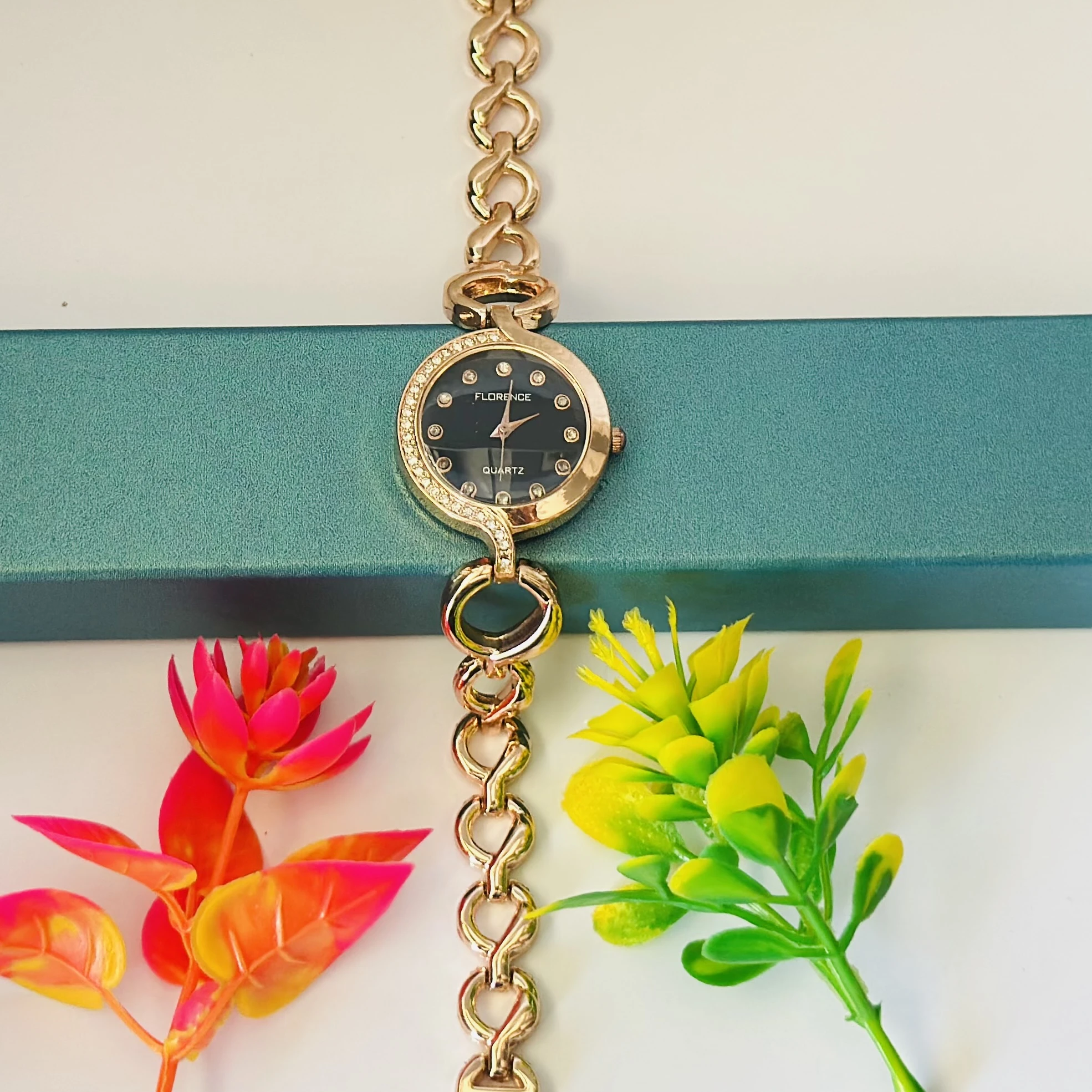 Women’s rose gold-tone quartz watch
