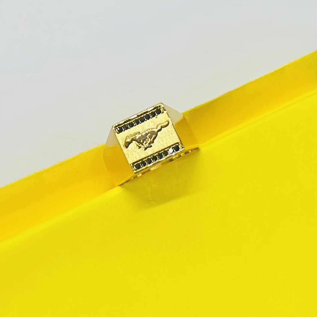 Gold colored Ford Mustang men's ring featuring the running horse logo.