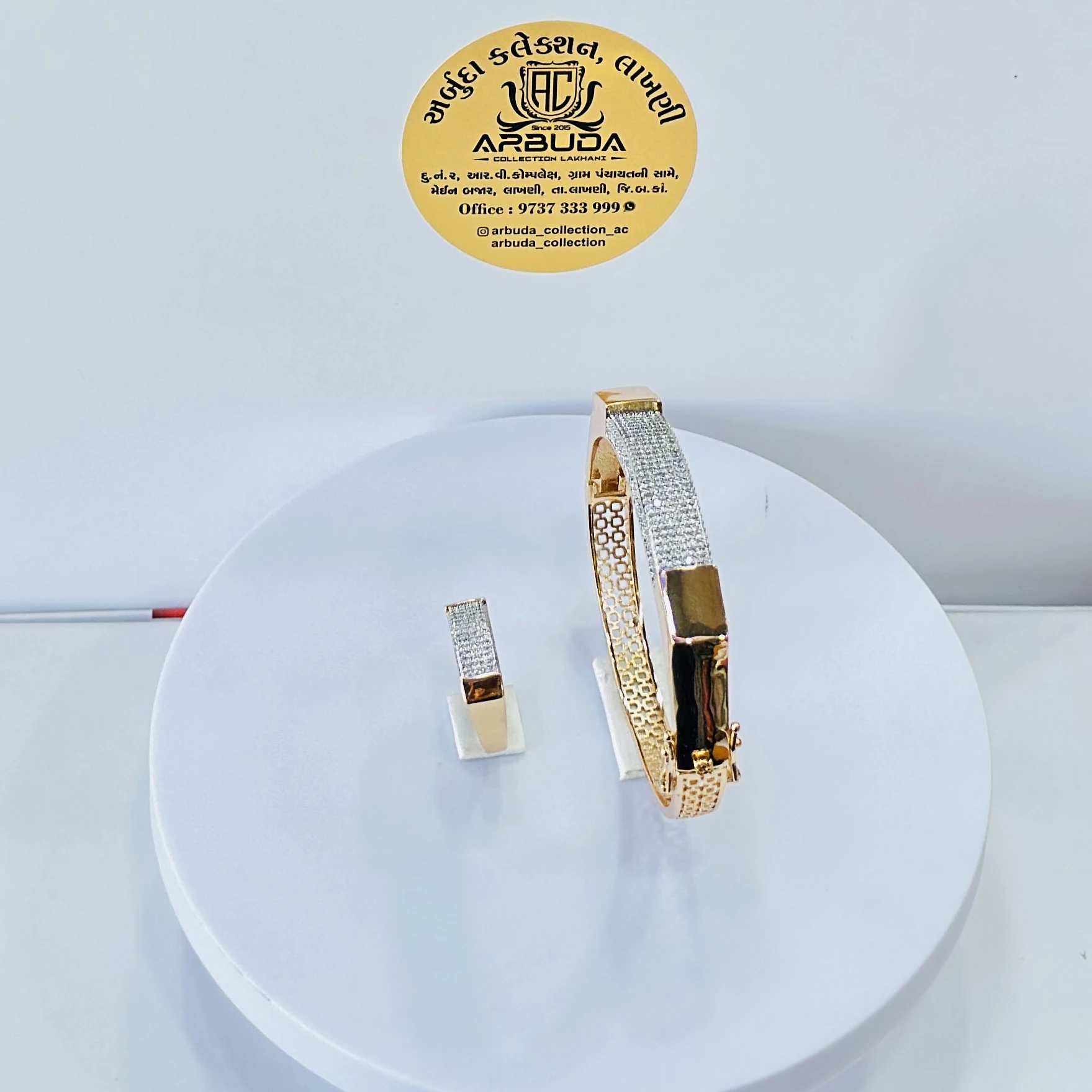 Gold toned Kada  and ring set