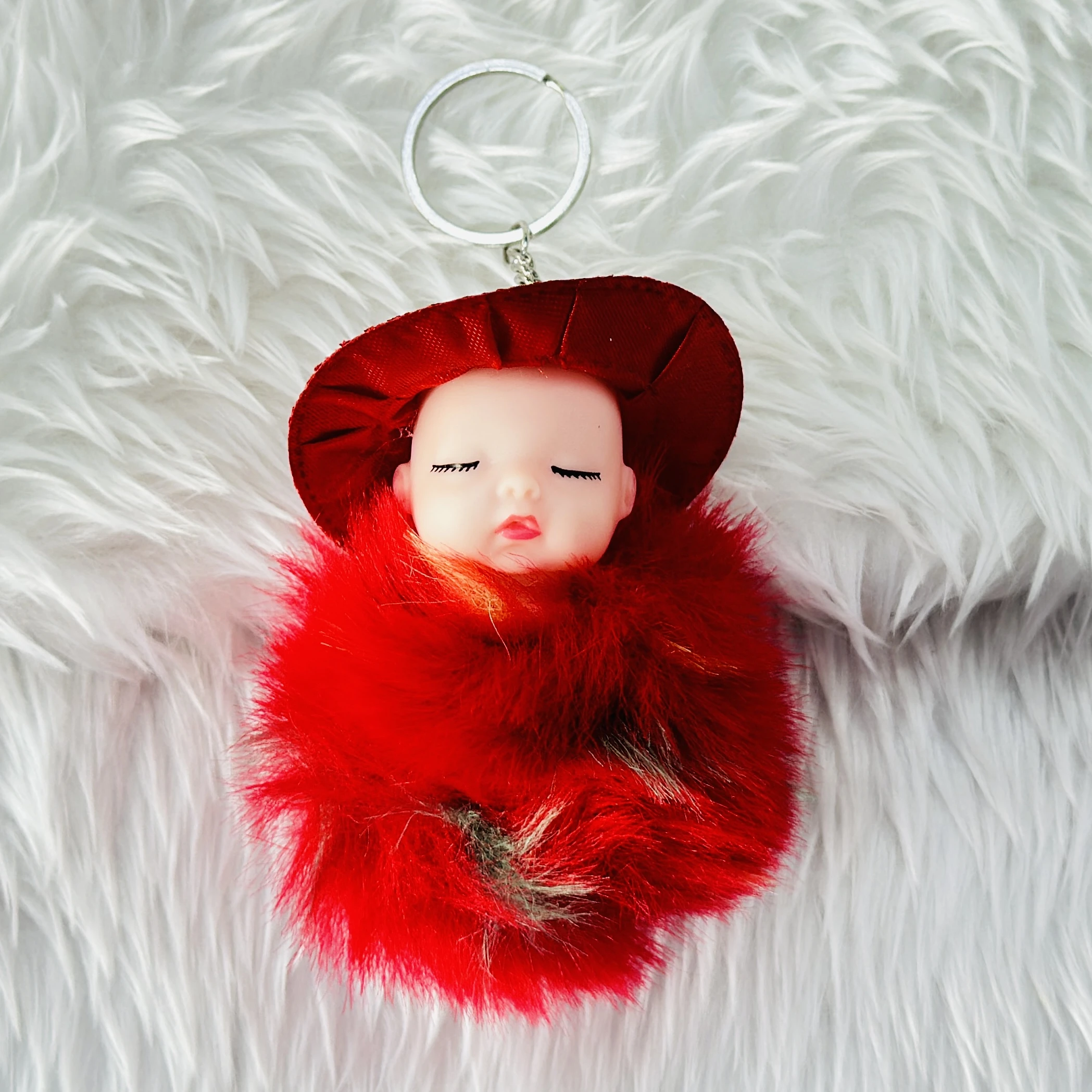 SRG Cute Sleeping Furry Baby doll with cap" keychain