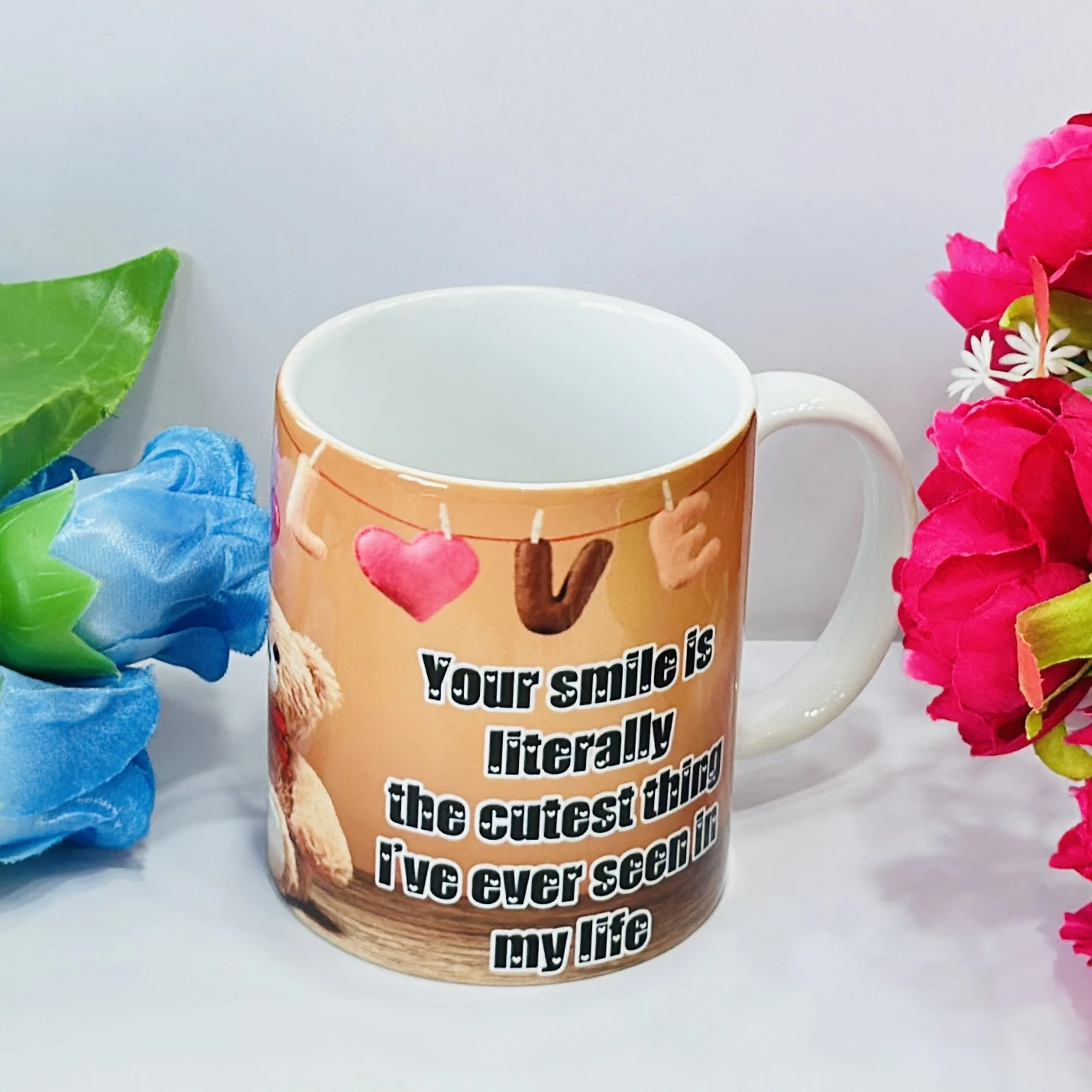 ceramic coffee mug with a teddy bear and heart design. ….5OQYAY