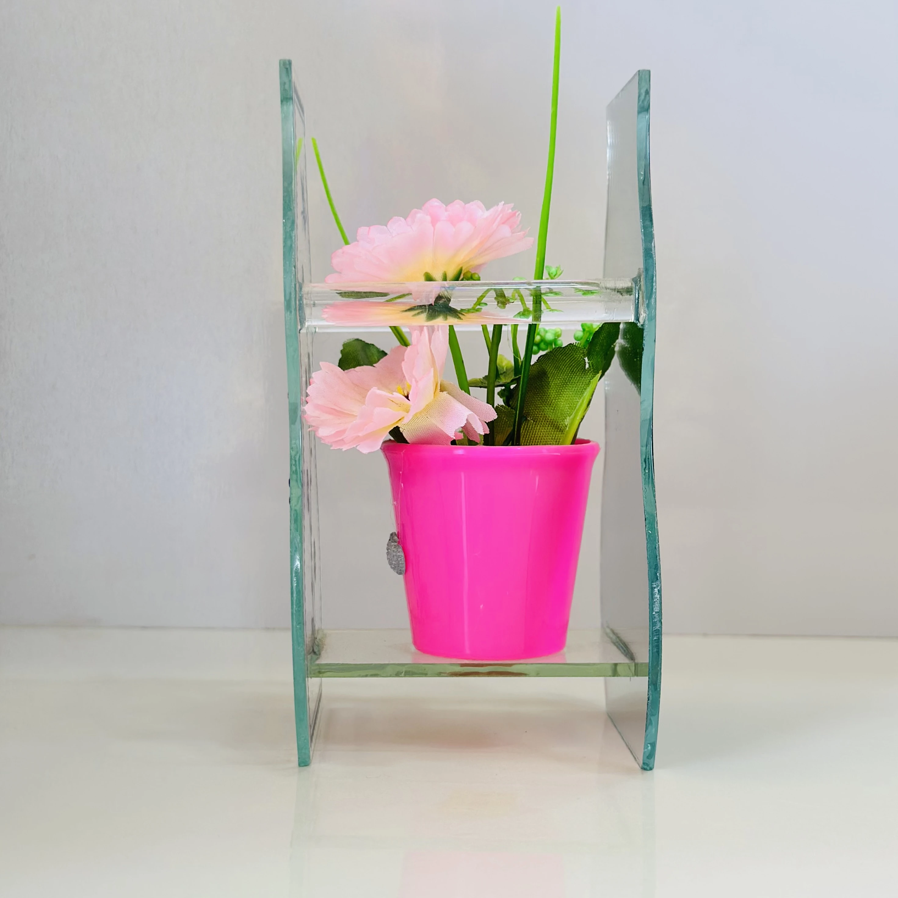 decorative glass vase with a purple pot and artificial flowers inside.(SKU-7QH3CH)