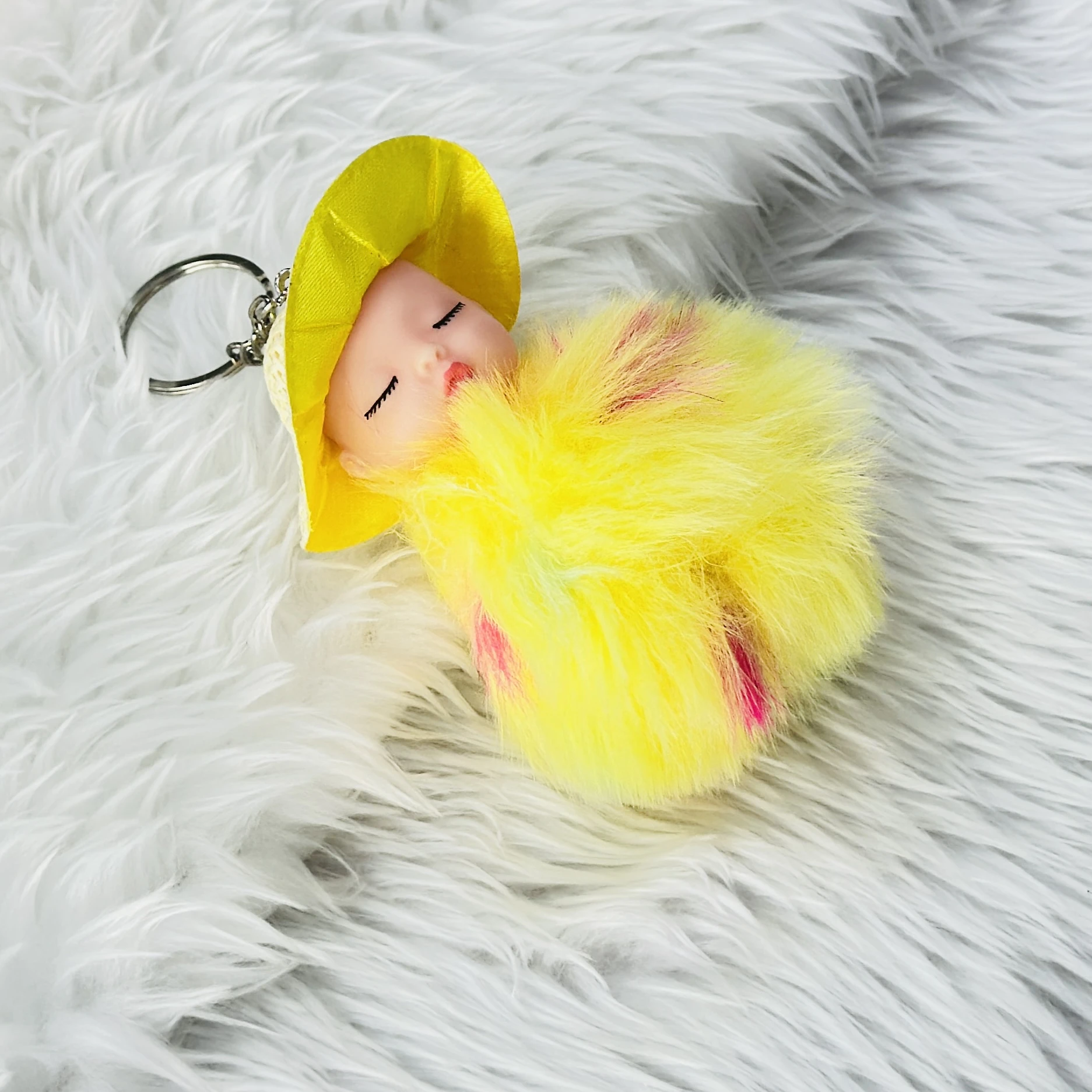 SRG Cute Sleeping Furry Baby doll with cap" keychain
