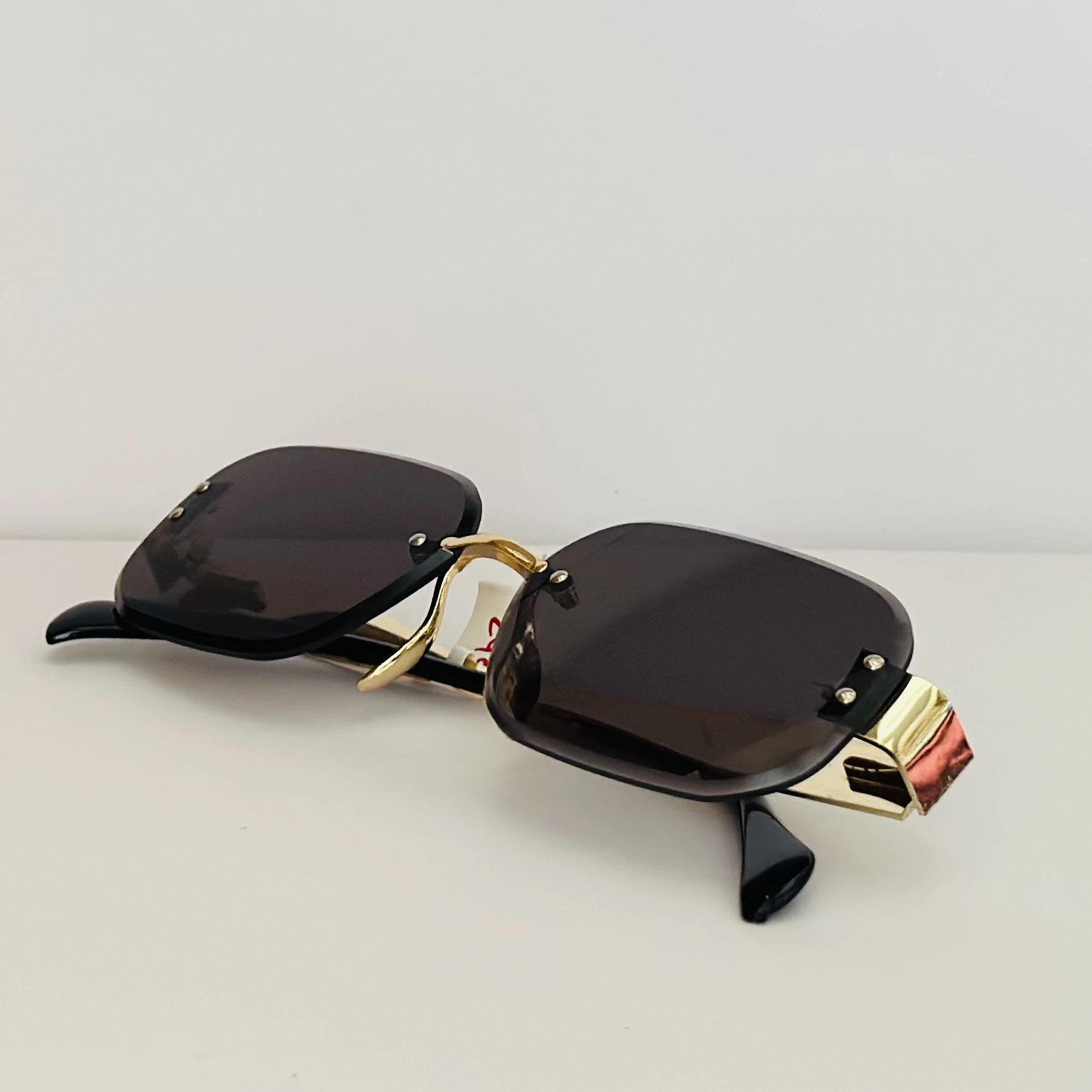 Cartier Santos de Cartier CT0460S rimless rectangular sunglasses