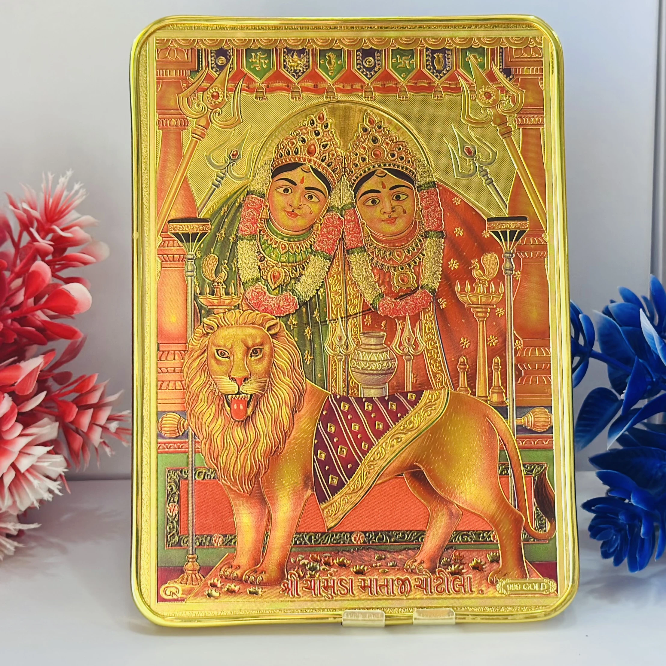 Golden foil photo frame of Shri Chamunda Mataji.
