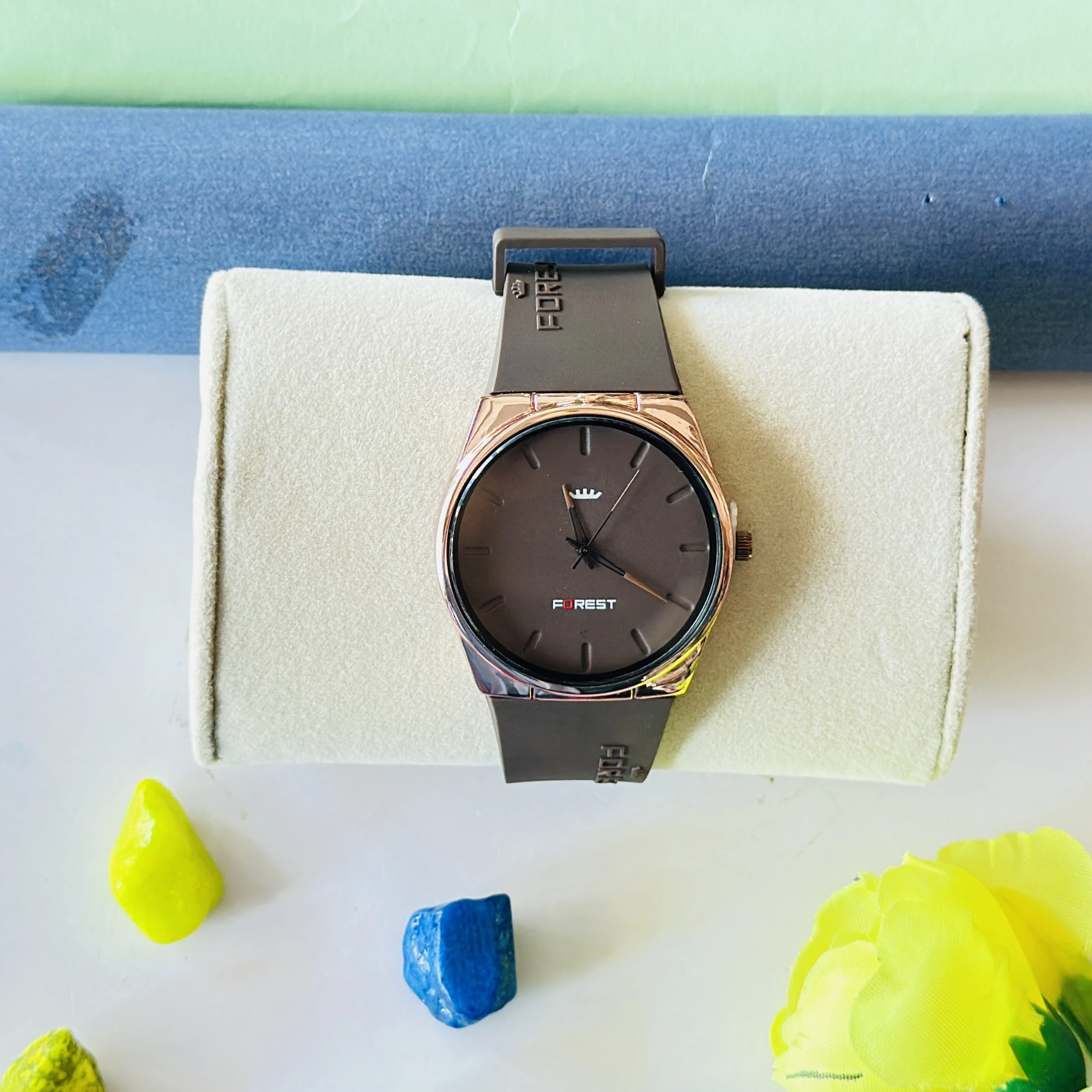 Forest Men's Analog Watch featuring a rose gold-toned round dial and a brown silicone strap