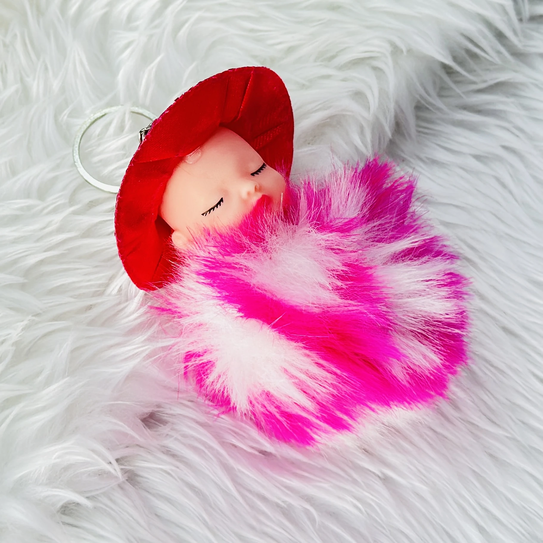 fluffy sleeping baby doll keychain