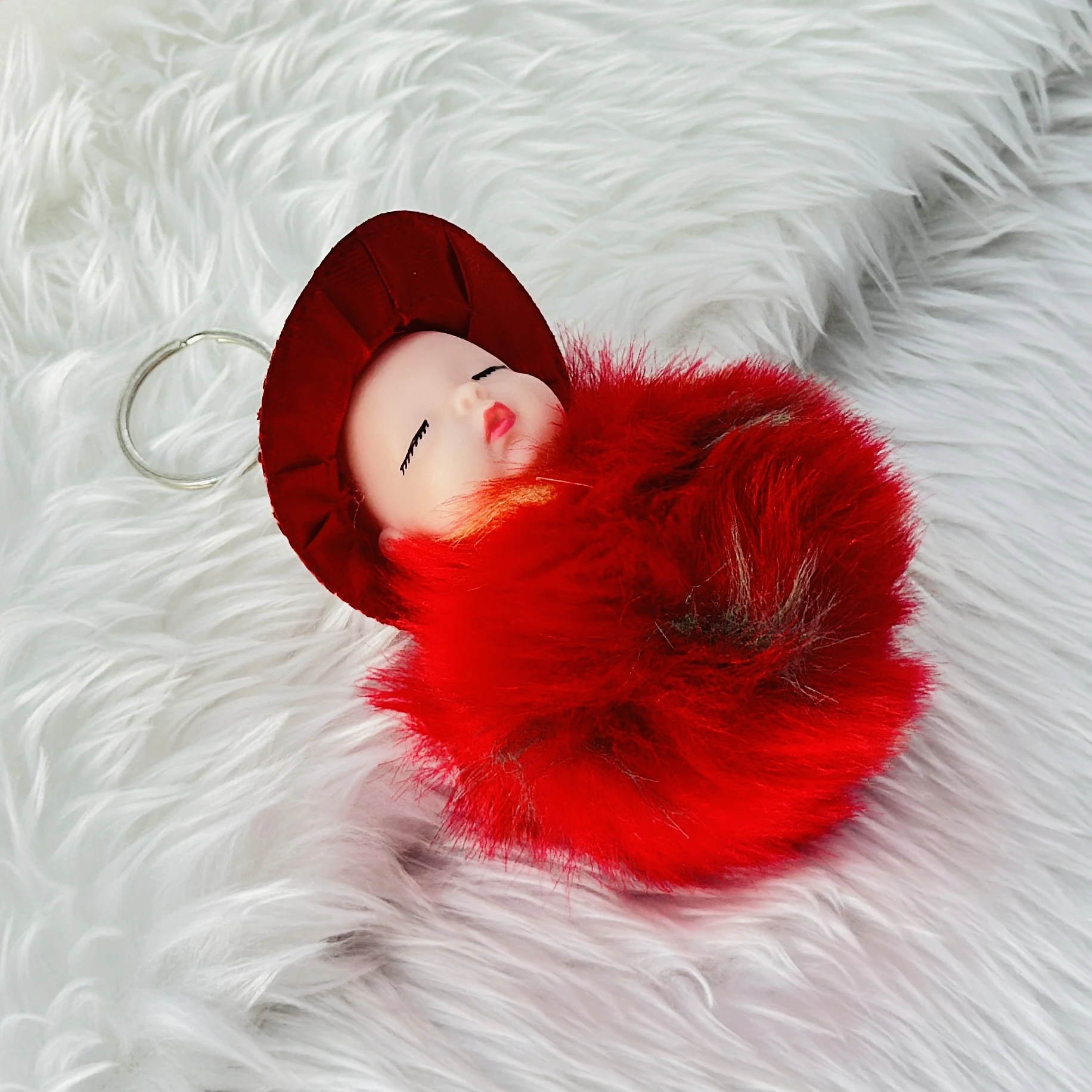 SRG Cute Sleeping Furry Baby doll with cap" keychain