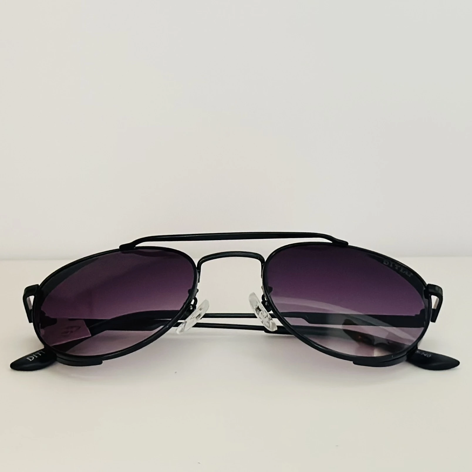 Black metal aviator-style sunglasses