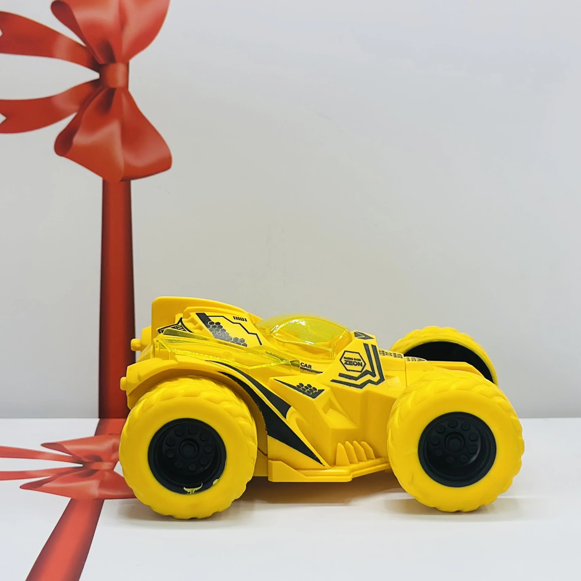 friction-powered toy stunt car