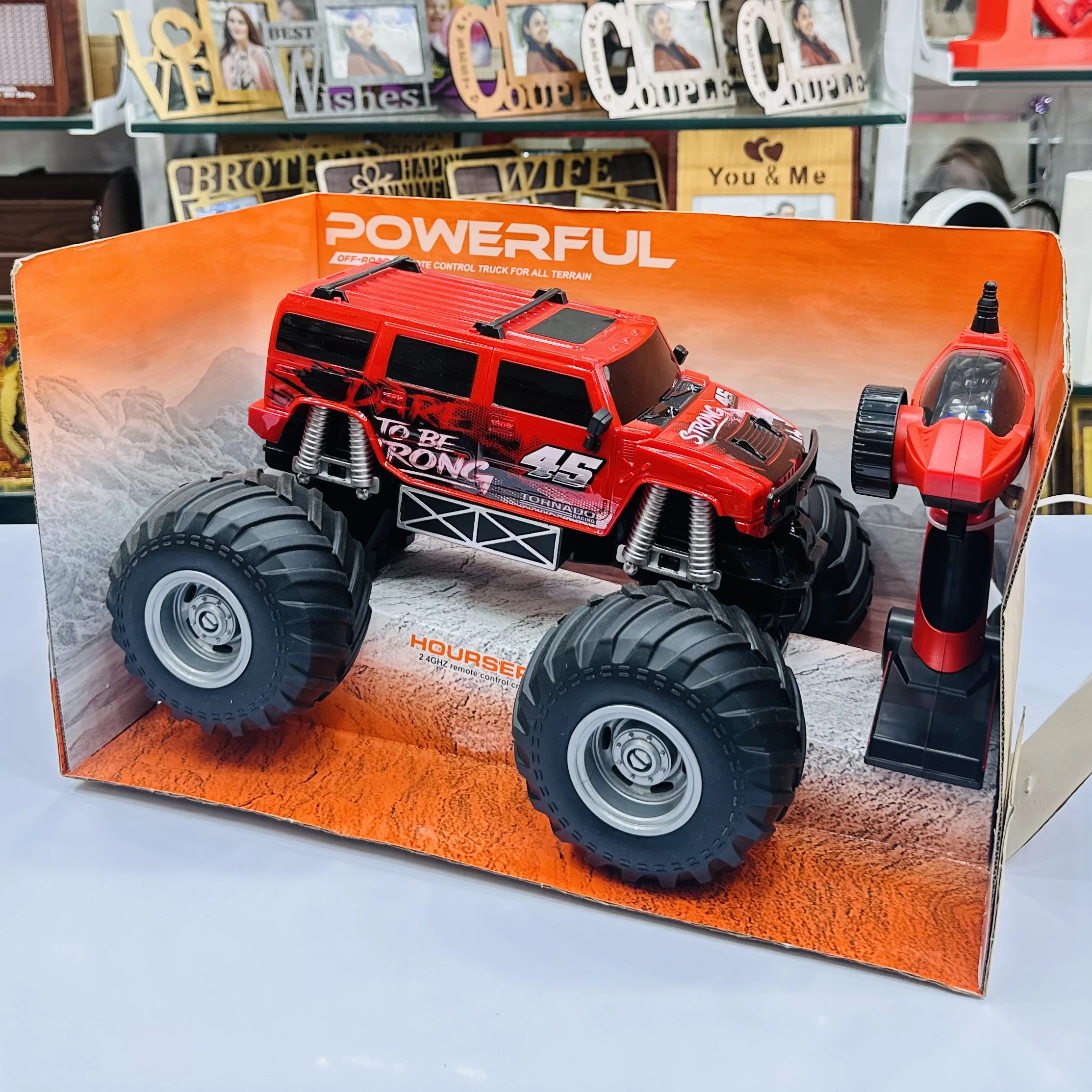 "Spray Climb" remote-control monster truck toy.