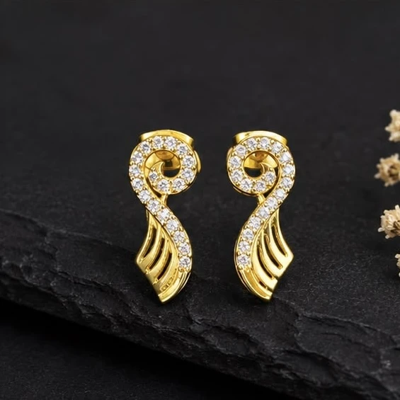 traditional Indian gold-plated drop earrings feature a triangular stud design