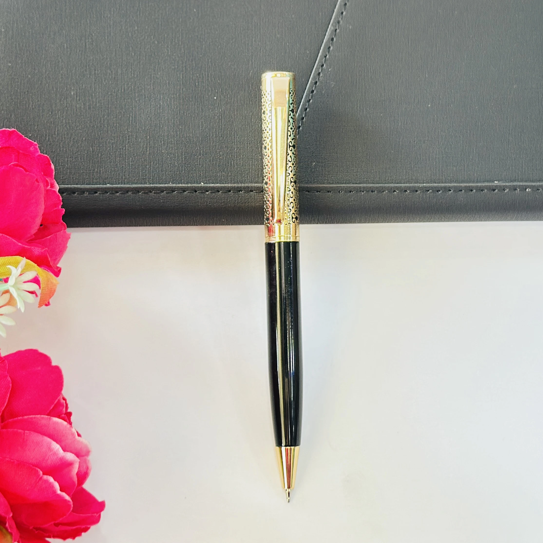 Black and gold ballpoint pen