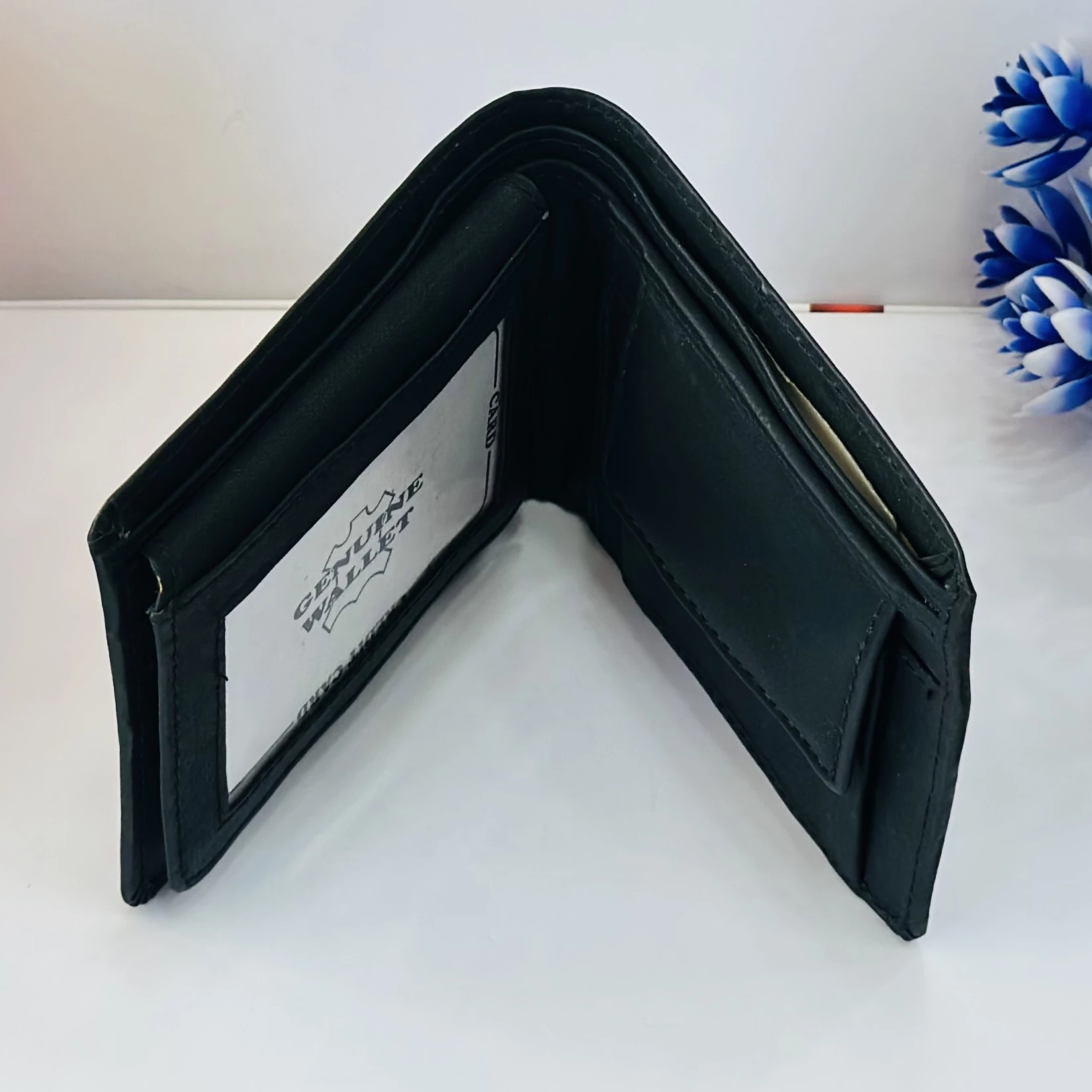 Black leather bi-fold men's wallet