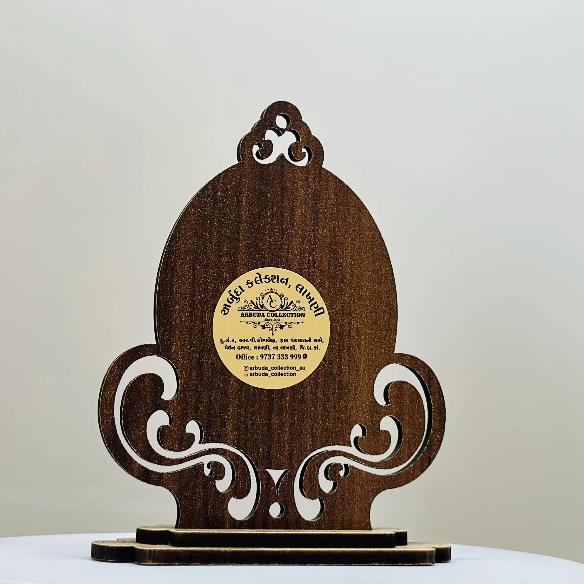 wooden showpiece featuring the Hindu deity Raja Meldi