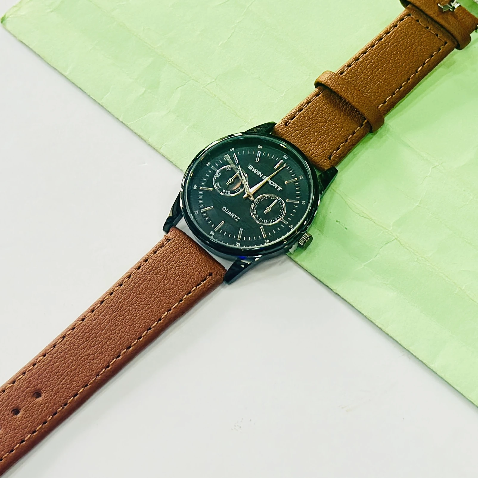 appears to be an AWIN SPORT quartz watch