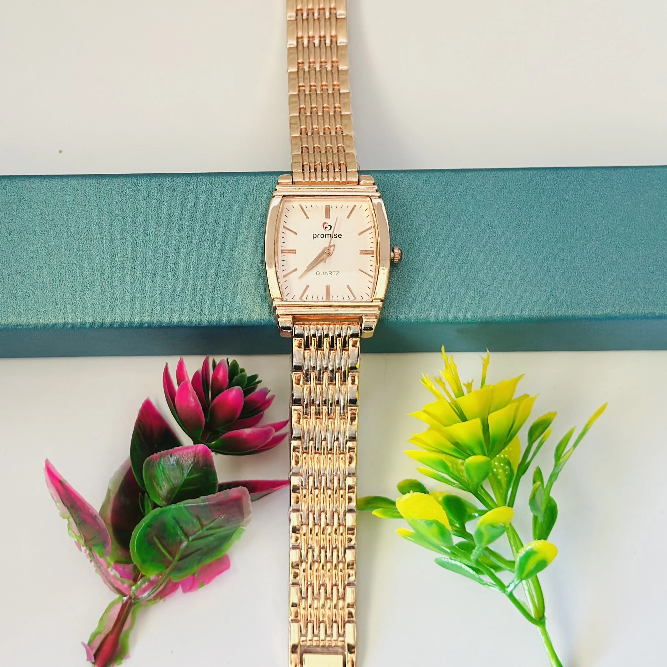 Rose gold analog watch