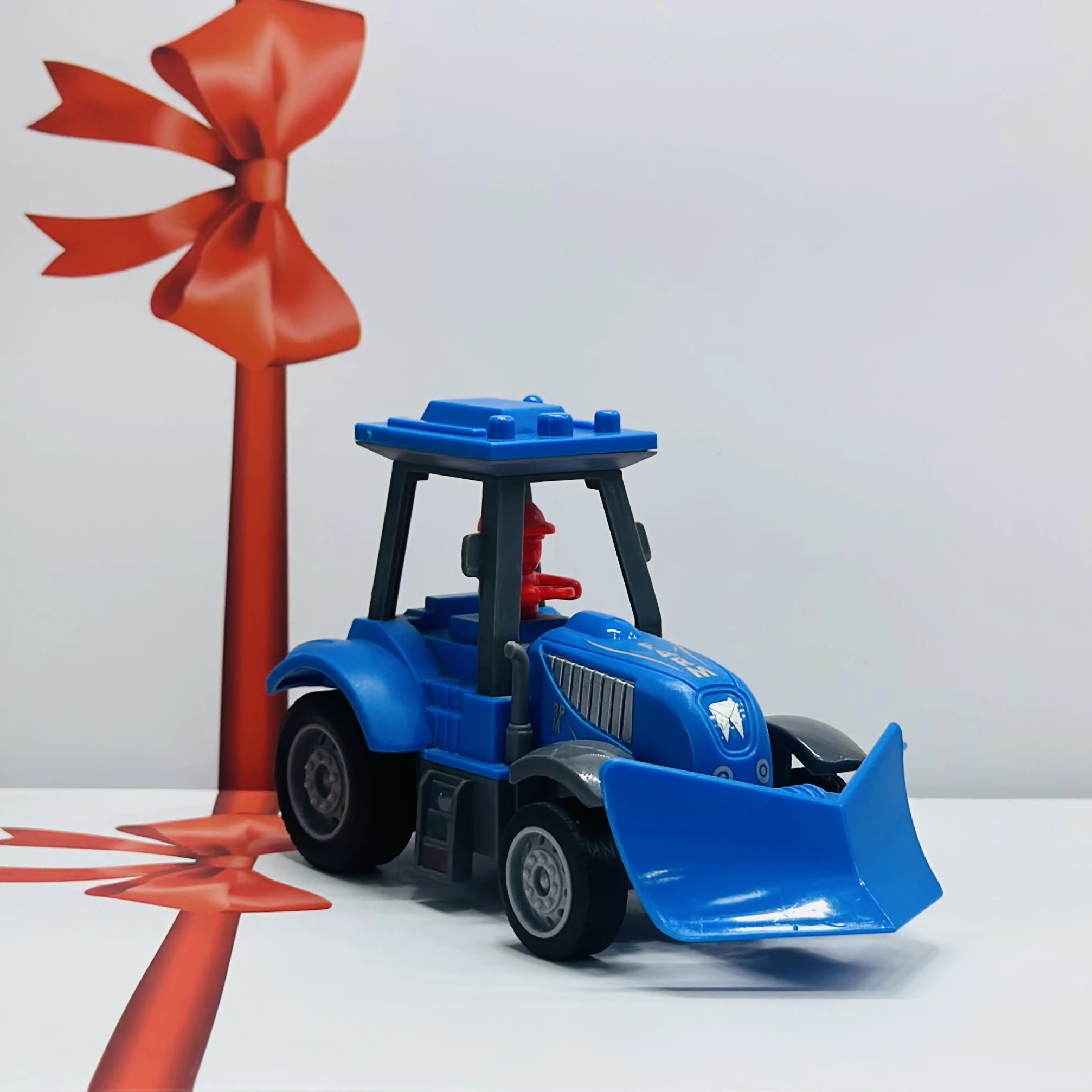 Blue plastic toy tractor