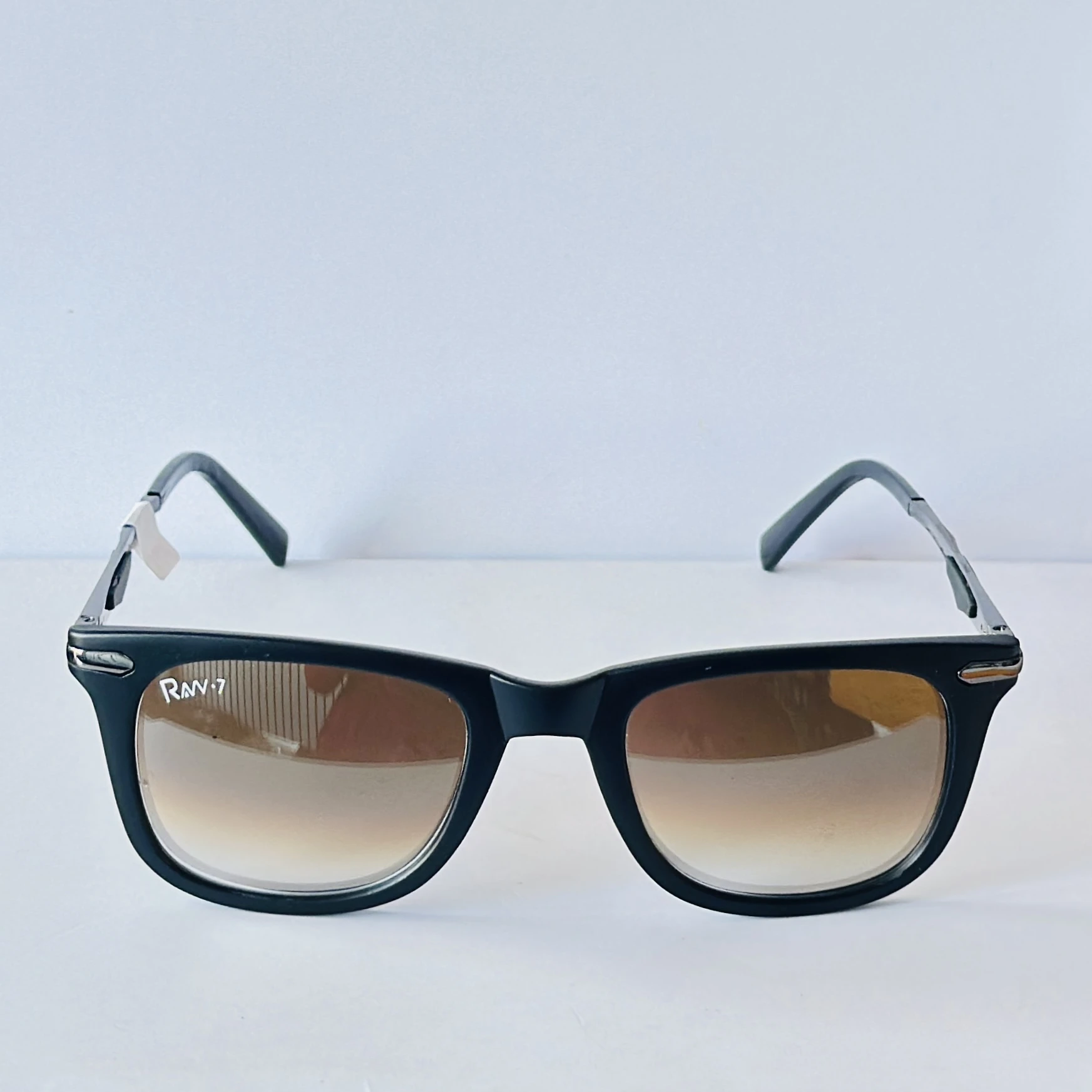 pair of Raw 7 branded men's rectangular sunglasses