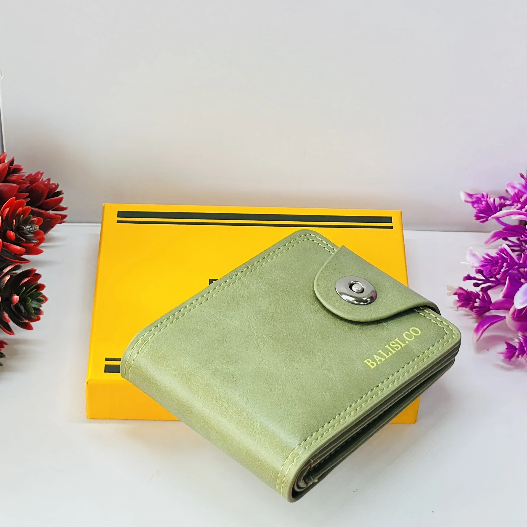 BALISI.CO green bi-fold wallet made from genuine leather.