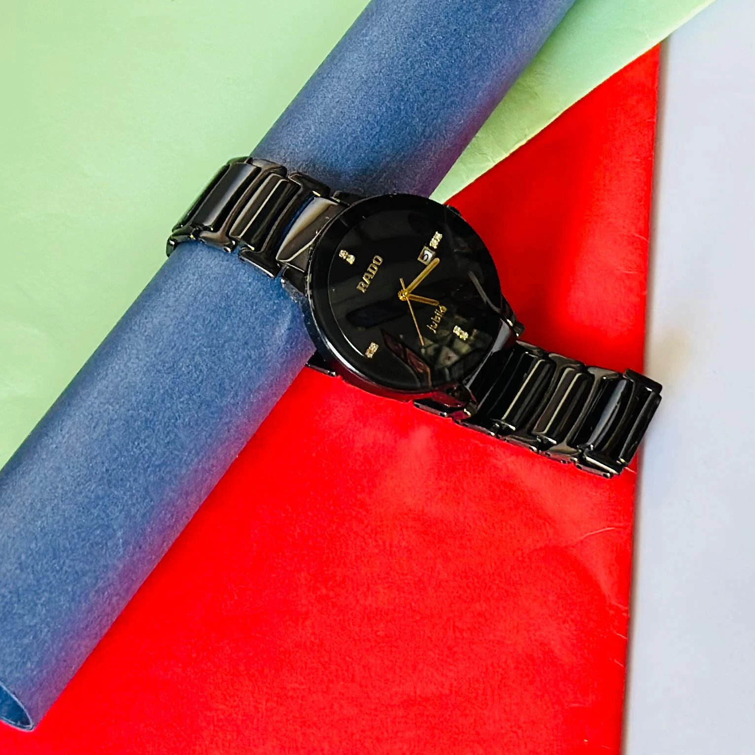 Rado Integral black ceramic and yellow gold-tone watch.