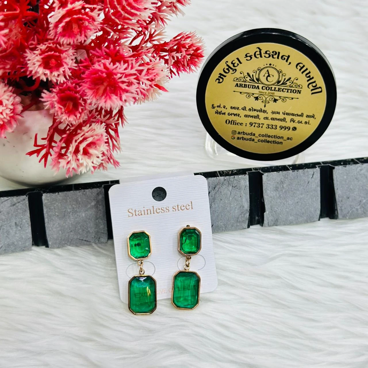 pair of emerald green drop earrings