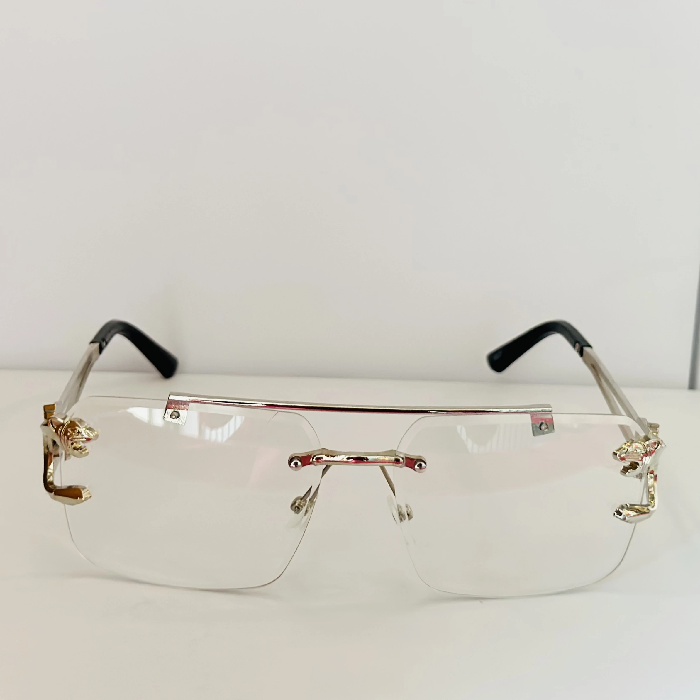 RioRabbit Mobster silver-frame rimless square eyeglasses with blue light blocking technology.